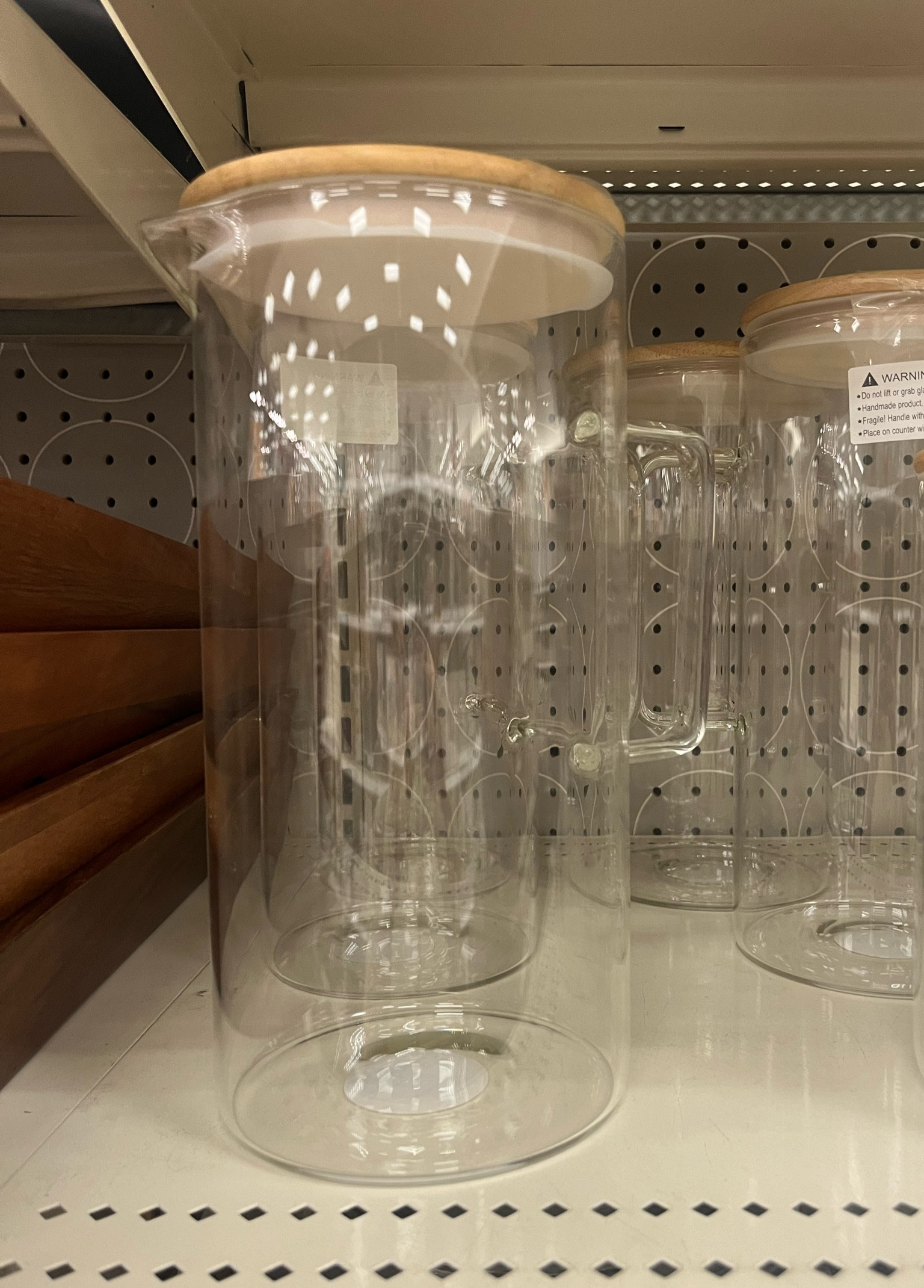 Glass pitcher with wooden lids. 

#LTKHome #LTKOver40 #LTKSeasonal