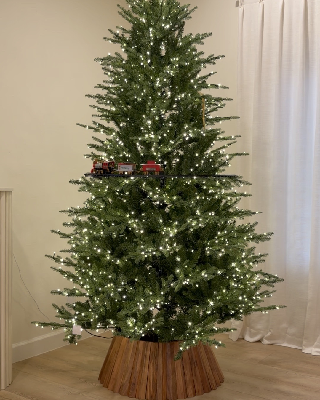 Viral twinkling light tree with tree train and 2 different tree collar designs! 

#LTKSaleAlert #LTKHoliday #LTKSeasonal