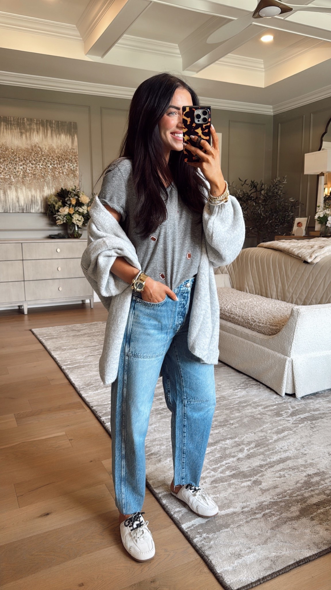 I’m in a size 26 regular in the pants. I’ve got a good amount of room, but I like this particular style Jean to look like that. This T-shirt comes in so many different color options….. as well as just a regular gray if you don’t want one with footballs! 

#LTKxMadewell