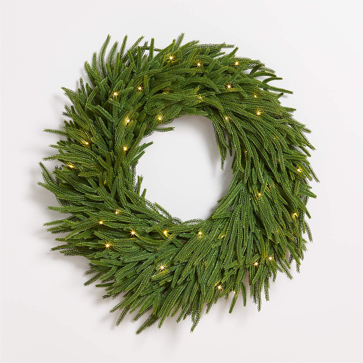 Faux Pre-Lit Norfolk Pine Wreath 28" + Reviews | Crate & Barrel | Crate & Barrel