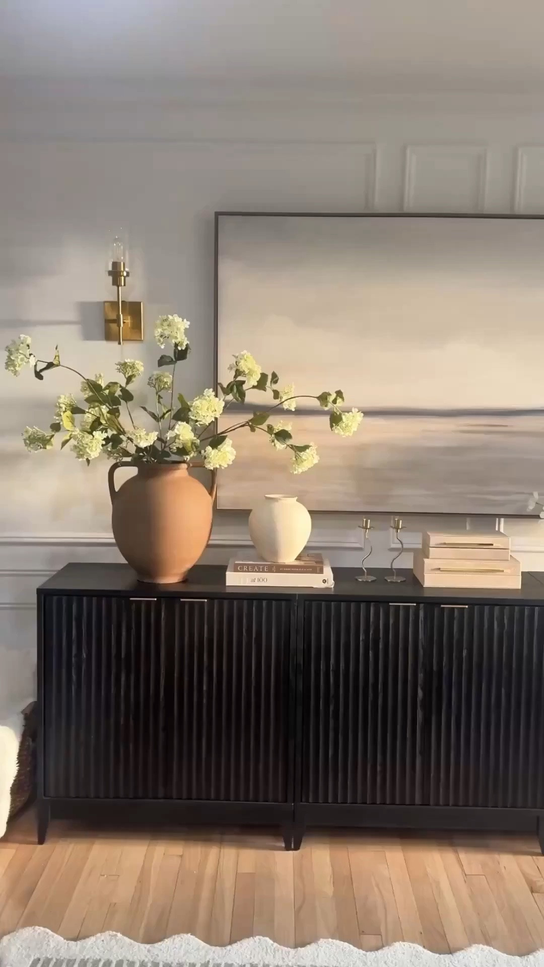 had to share a closer look at this dreamy combo because I’m still obsessed with how it turned out 🤎✨

this fluted cabinet paired with the oversized artwork gives the entryway such a cozy, elevated feel while still keeping everything soft and minimal. I actually styled three of the cabinets side by side to create the perfect length for our space and it completely transformed the whole area. 🌿

it’s one of those setups that feels custom, high-end, and designer-inspired without being overly complicated and I honestly couldn’t love it more.

the cabinet is currently on sale and the artwork just came back in stock, so I linked everything while it’s still available ✨

#LTKHome #LTKSaleAlert #entrywaydecor #modernorganic #neutralhome #designerlookforless

#LTKmomlife #LTKHome #LTKSaleAlert
