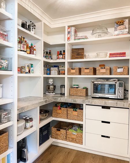 This pantry was organized with a few extra baskets and turntables. She already had most of the containment so I added more of what was already here … and space planned! Easy! 

#LTKfamily #LTKhome