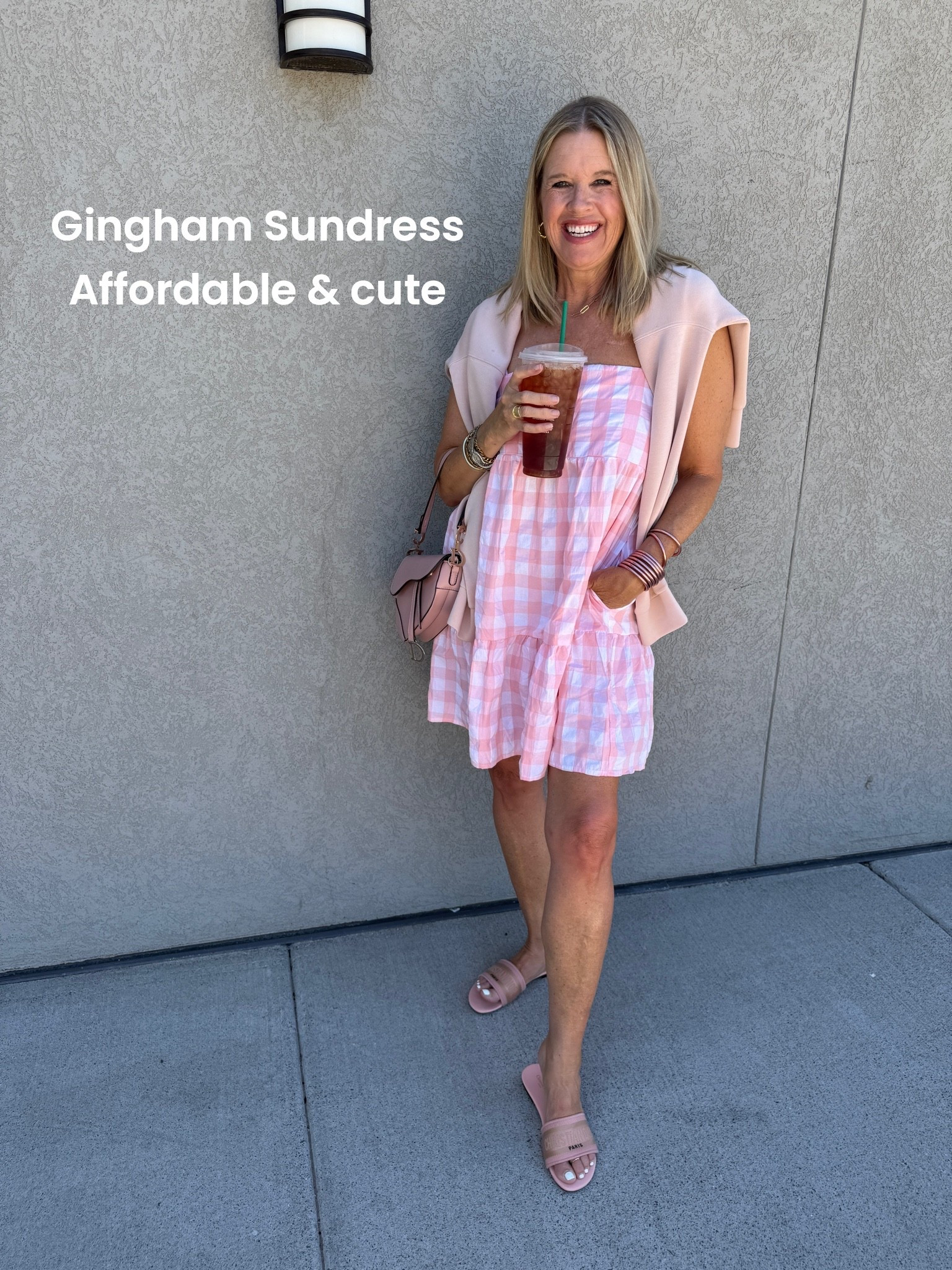 Splurge and save…
Outfit inspo

Gingham dress tts in a med 
Comes in other colors, have pockets tier detail
(I am wearing a slip) my  daughter in law has and didn’t … up to you

Splurge is my Christian Dior 
Slide sandals and saddle bag
In pink 

Buddha girl bracelets in rose 
Water proof and so good 

Gold hoops Amazon pack 

Spanx sweatshirt air essentials crew neck
Save 15% off with  code DEARDARCYXSPANX

#LTKdayinmylife #LTKootd #LTKOver40