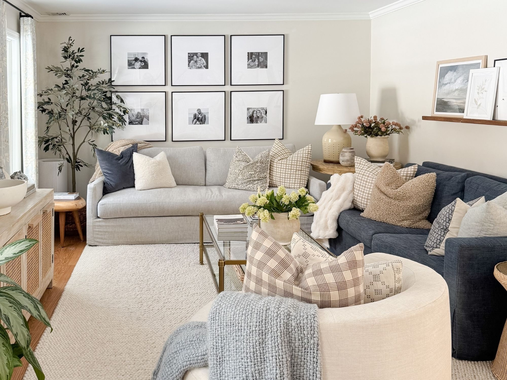 Coastal living room styled with neutral throw pillows, textured ivory rug, faux florals, and layered sofas for a relaxed high end coastal look.

coastal living room decor, neutral throw pillows, textured ivory rug, faux floral decor, layered living room styling, coastal home decor, neutral sofa styling, coffee table florals, light coastal interiors, sherricalnanhome

#LTKHome