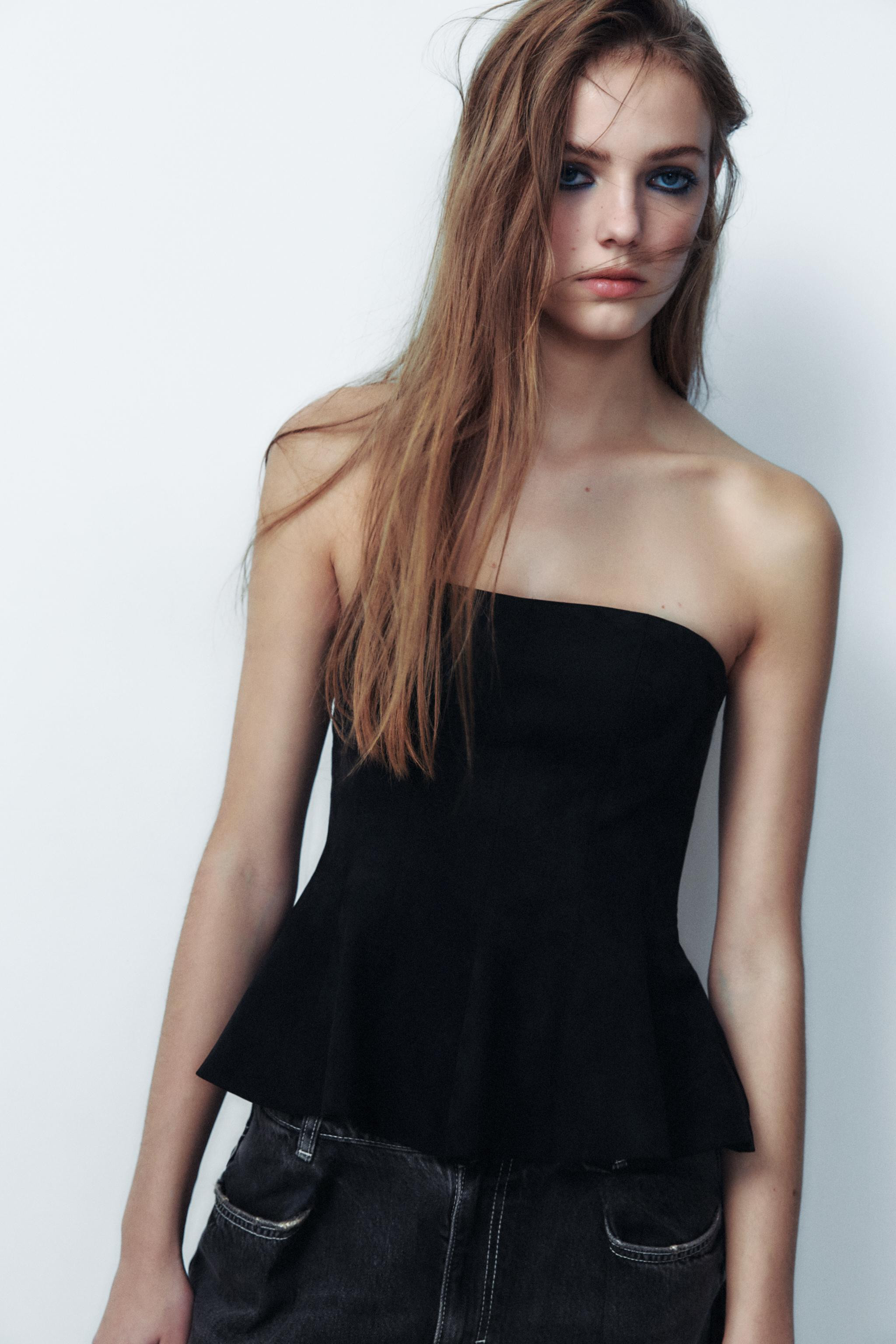 Strapless top with straight neckline. Matching interior lining. Peplum hem. Hidden zip closure at... | Zara US