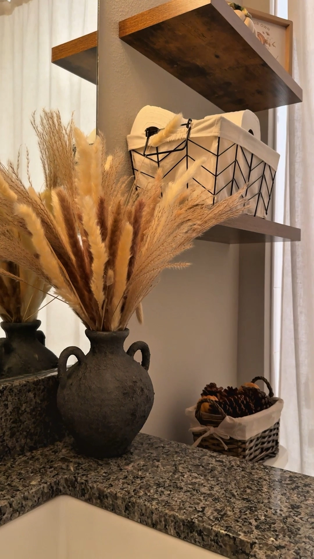 Fresh greenery turned into warm tones and autumn accents 🤎 who else loves a bathroom refresh for fall? 🍂🪞 #FallHomeDecor #LTKStyle

#LTKSaleAlert #LTKHome #LTKSeasonal