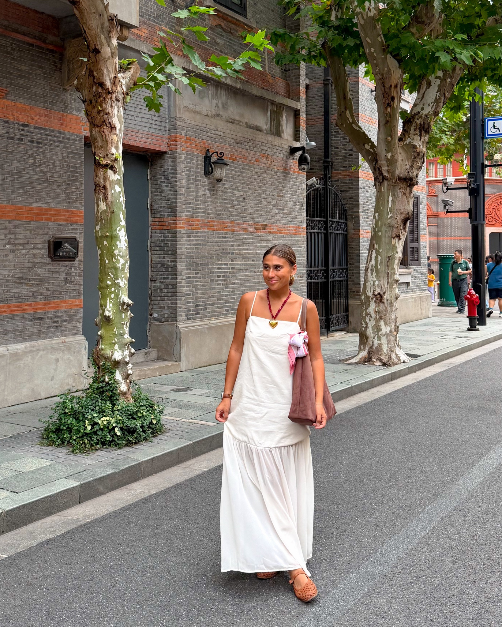 favorite outfit i wore in shanghai, china — perfect for summer or a fall transition outfit! super flowy and perfect for vacation 

#LTKTravel #LTKootd #LTKFindsUnder50