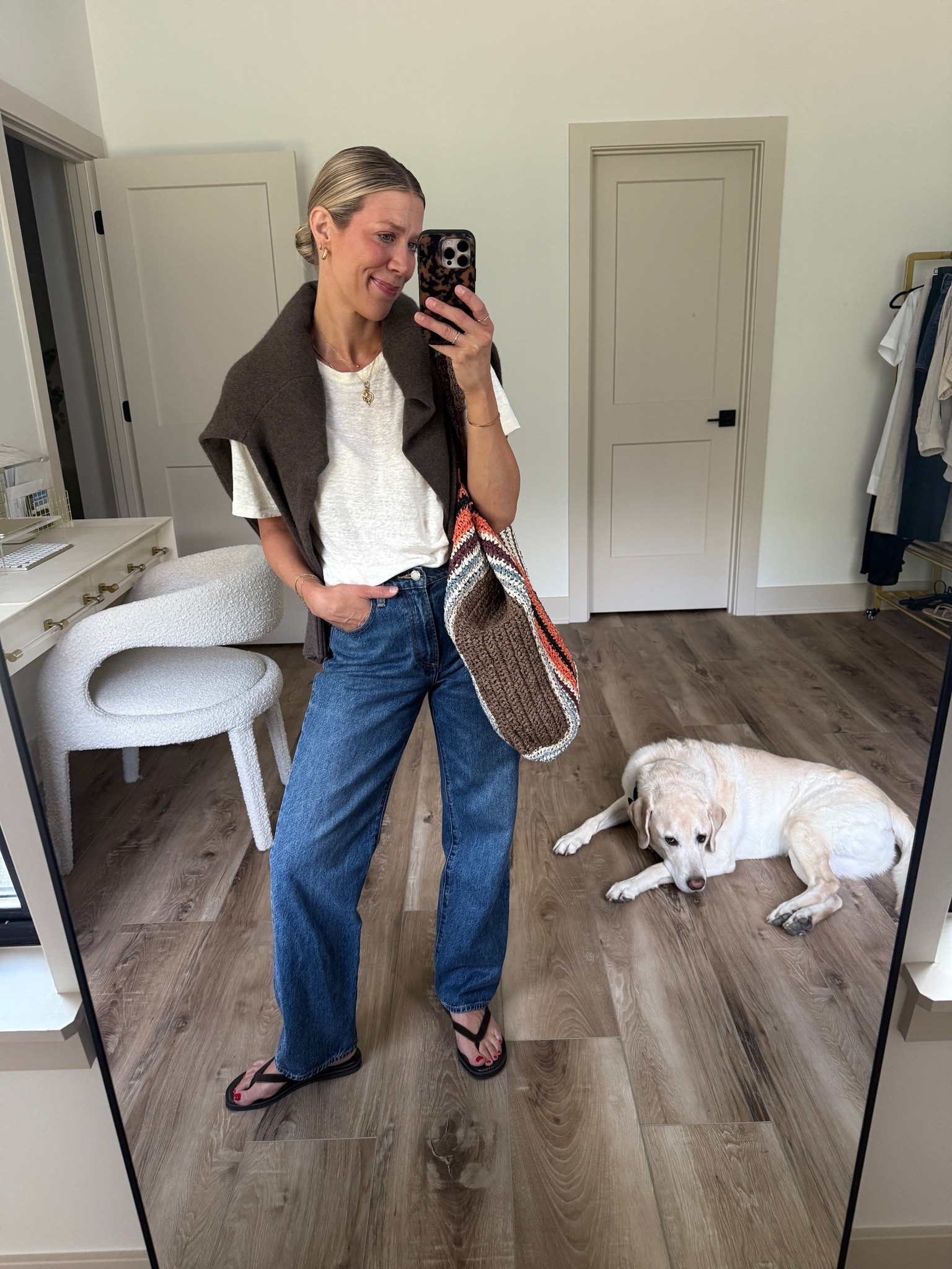 Wearing small linen tee, small cashmere sweater, 25 jeans, sandals tts