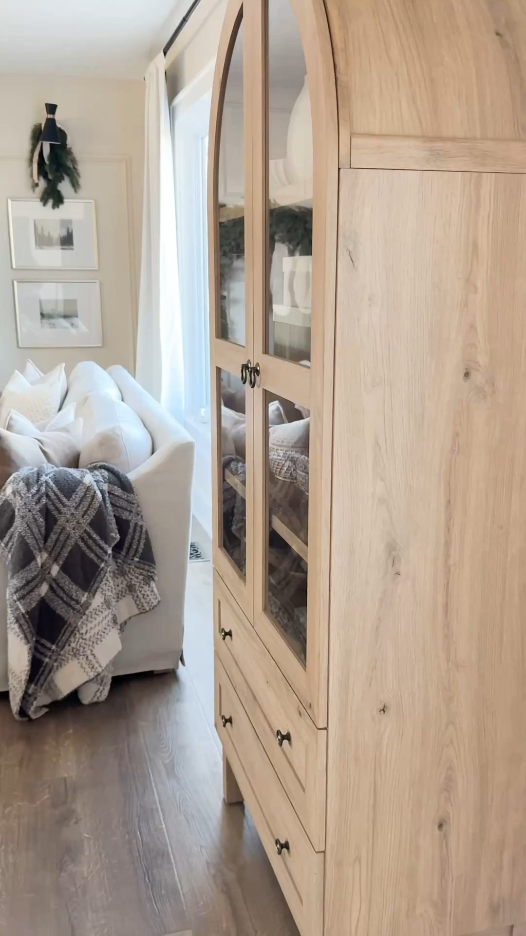 Winter living room views

Arched cabinet, sofa, couch, area rug neutral rug, wall frame, throw pillow, home decor, living room 

#LTKHoliday #LTKSaleAlert #LTKHome