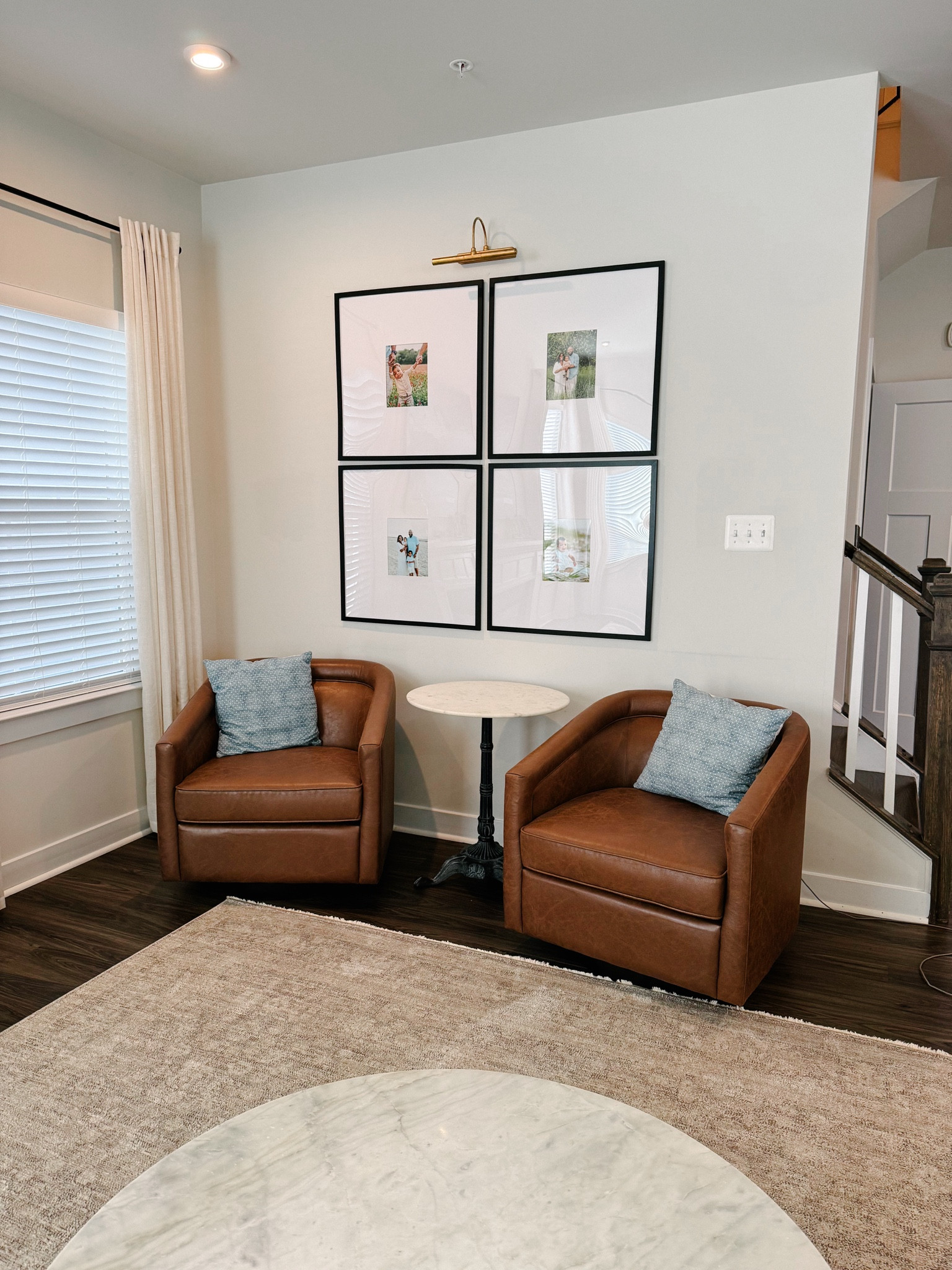 Cognac swivel chairs for our family room with a neutral rug. 

#LTKHome
