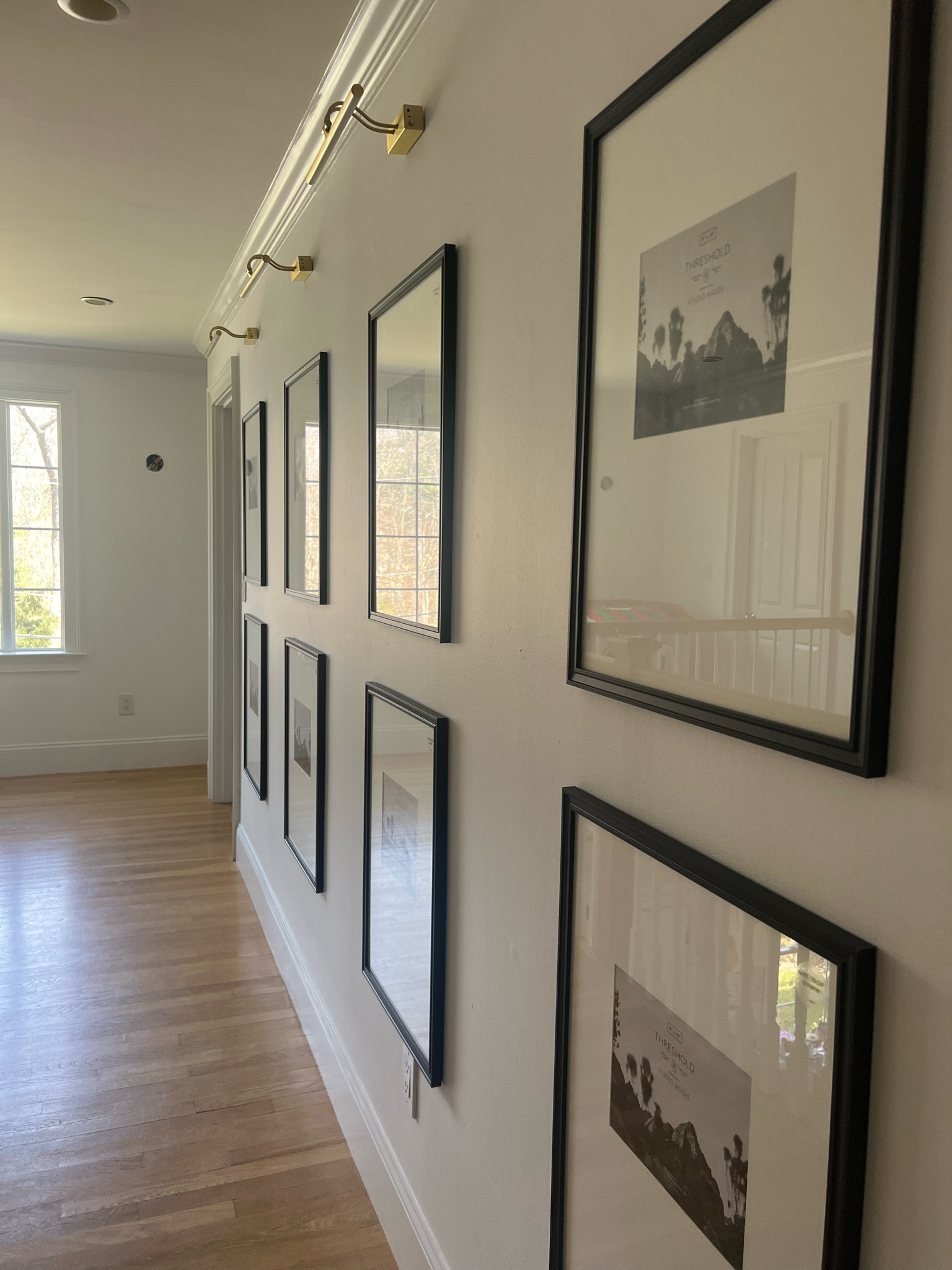 Adding small details as we approach 3years in this home! The lights are chargeable (no wires!) the matted frames look so much more expensive than they are!