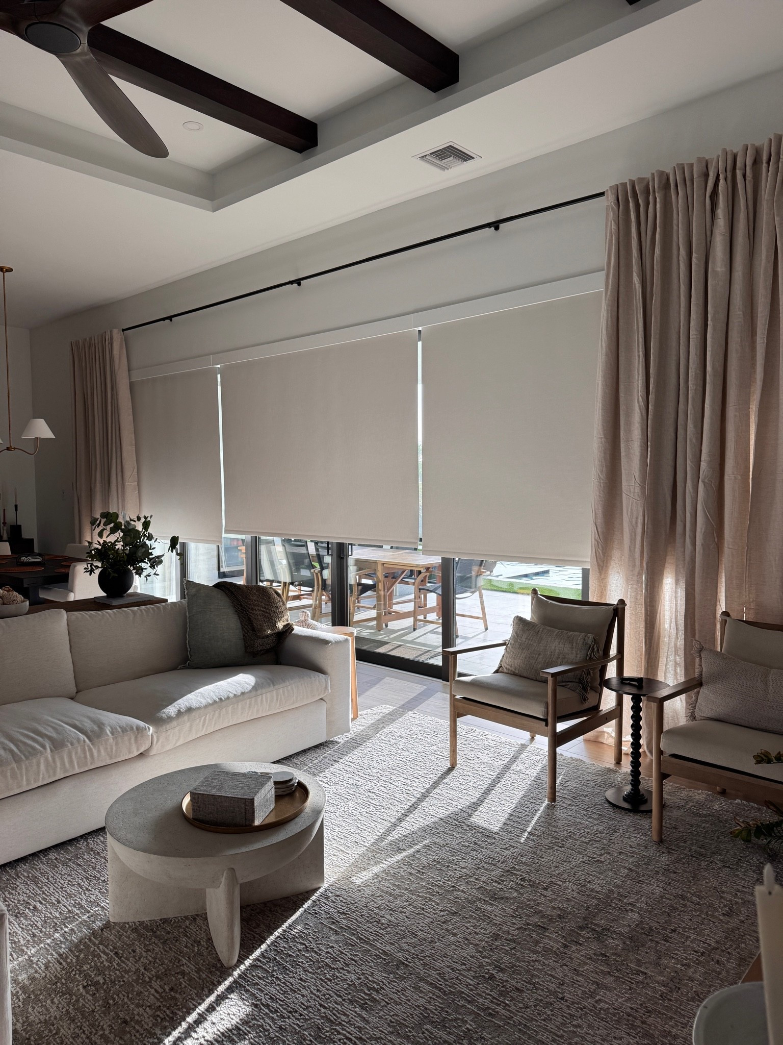 I love my new quince curtains 🥰 they are bringing much needed softness and texture to our dining and living room space! 

This wall has always been a challenge since it expands over 250 inches 😅 I ordered both rods to help me get the length without paying for a custom rod 🤍￼￼
￼
i’m using these curtains more as decorative than functional since we have the amazing drop-down blackout shades you see.

Linking everything for my windows here