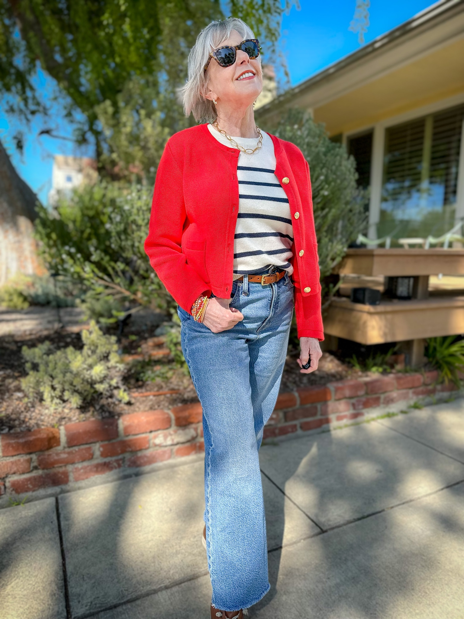 Classic casual style with wide leg jeans, a striped top and cropped sweater jacket  

#LTKSeasonal