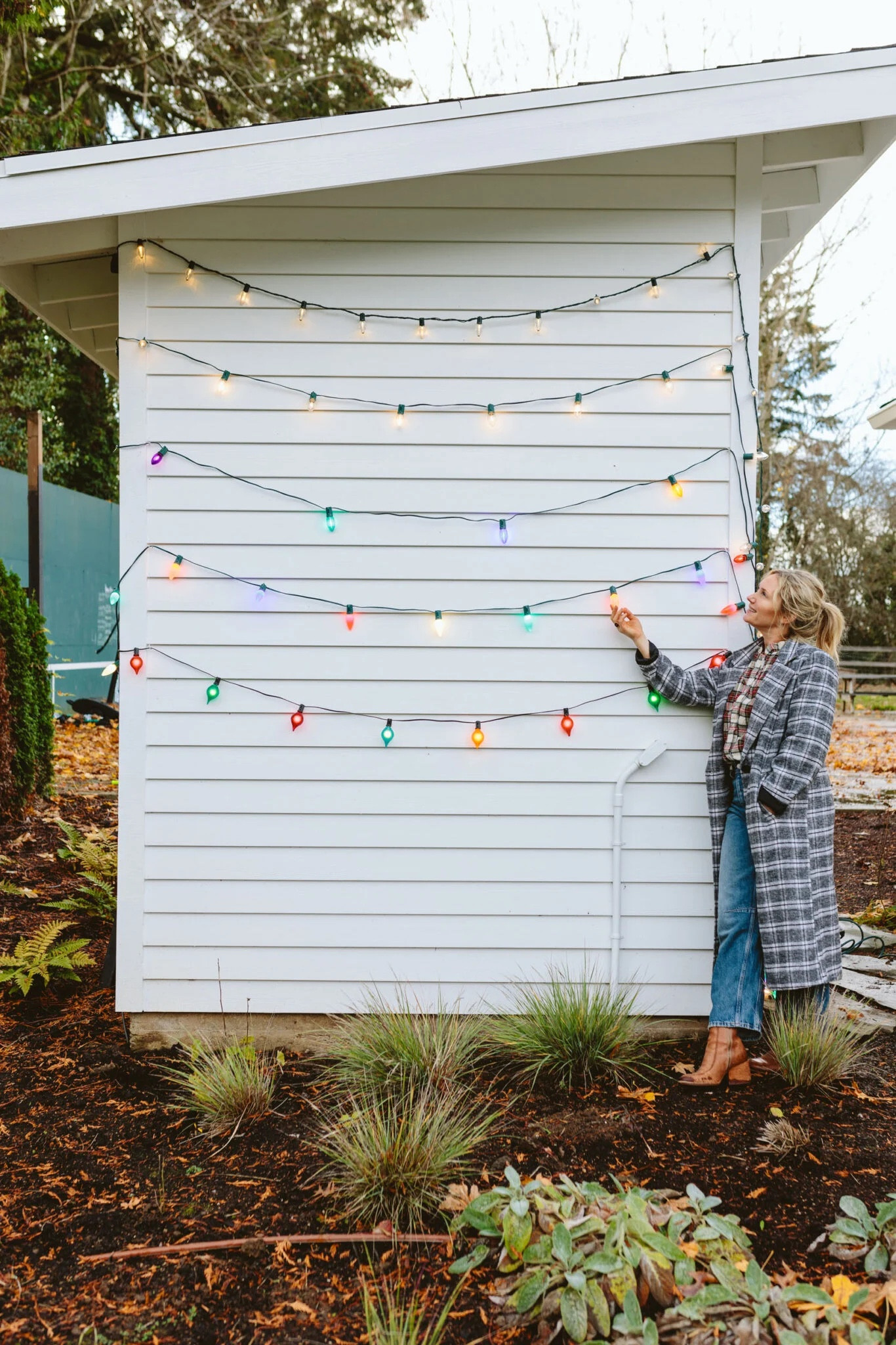 HOLIDAY LIGHT REVIEW!!! We are doing what many chic designers say NOT to do (they fear it’s tacky? I call BS) putting up colorful lights because the Hendersons want colorful Christmas lights on our house. The house is bright white and during these dark months, we want color, not more cold lights. But finding the right colorful LED lights is hard so I tested a bunch on our shed. Brian came outside and immediately picked one, I agreed, so we went with it. They are the C9 OptiCore Multicolor LED-style lights. Do we love them? YES. But once they were strung up they were pretty darn bright. 

We chose the 100 lights for 100 feet (aka one per foot) and it’s pretty dang bright at night, so I think if I could go back in time (which I can’t) I would go with the 75 per 150 feet (aka one every two feet). Also, be warned that the 100 light package comes unassembled – you have to screw the bulb into the string – but they are shatterproof (even though they look like glass). 

More importantly for those of you who want legit warm LED white lights, these are THE BEST. Many white lights say they are “warm” but they aren’t – they are still kinda cold and they look corporate and not cozy. We tested these and they are legit warm and beautiful. My brother put them on their house and they love them. 

So in conclusion, if you are going colorful, we love the C9 OptiCore Multicolor LED-style lights (just choose the number of lights carefully) and for white lights, we love these ones.

#LTKSeasonal #LTKHome #LTKHoliday