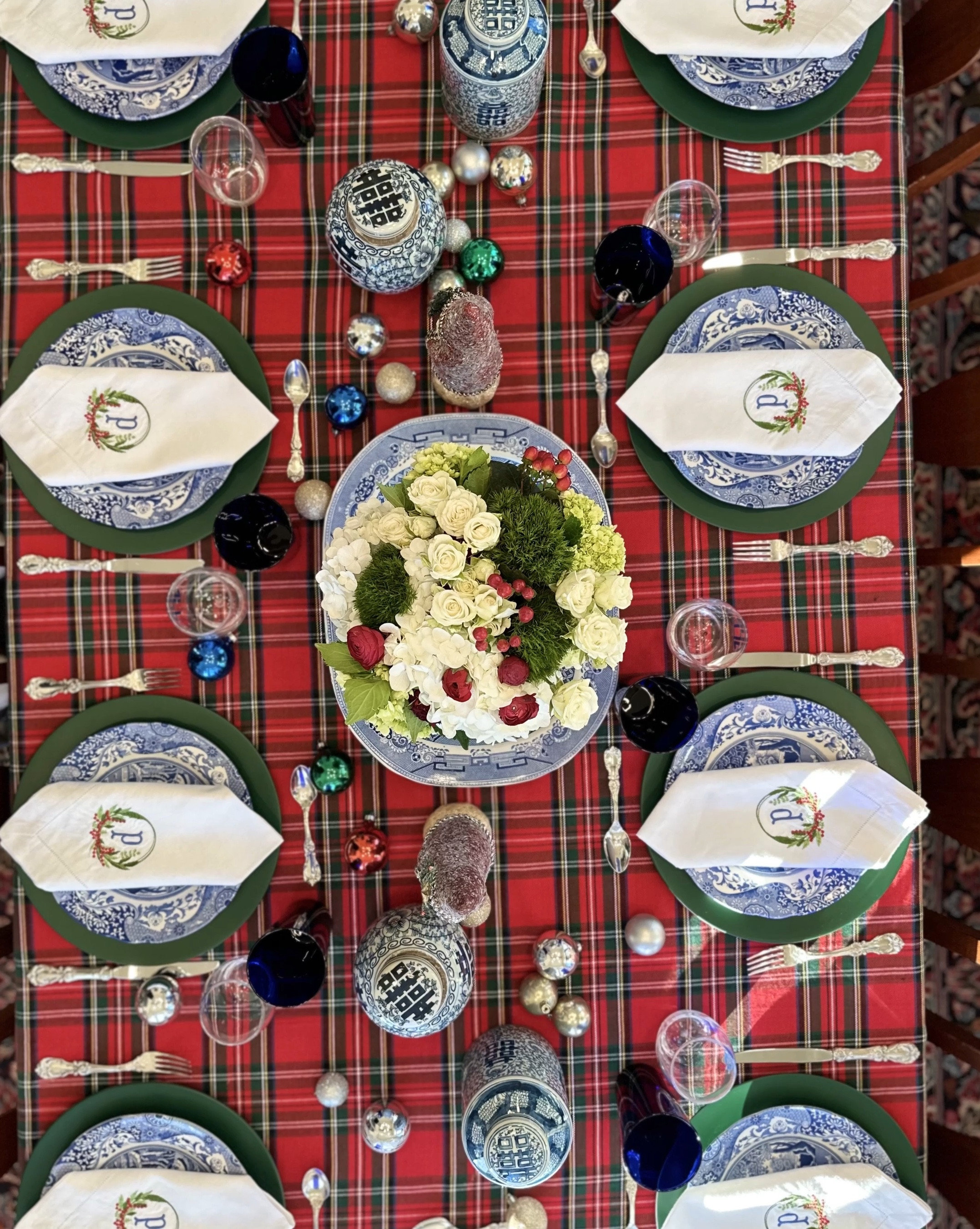 Beautiful tartan plaid and blue and white Christmas table. I loved this tablecloth so much, I bought four of them as well as 16 napkins. Ha!!  They are great quality and wash and wear extremely well. I highly recommend them!  Christmas. Tabletop. Christmas plaid  

#LTKVideo 

#LTKHoliday #LTKHome