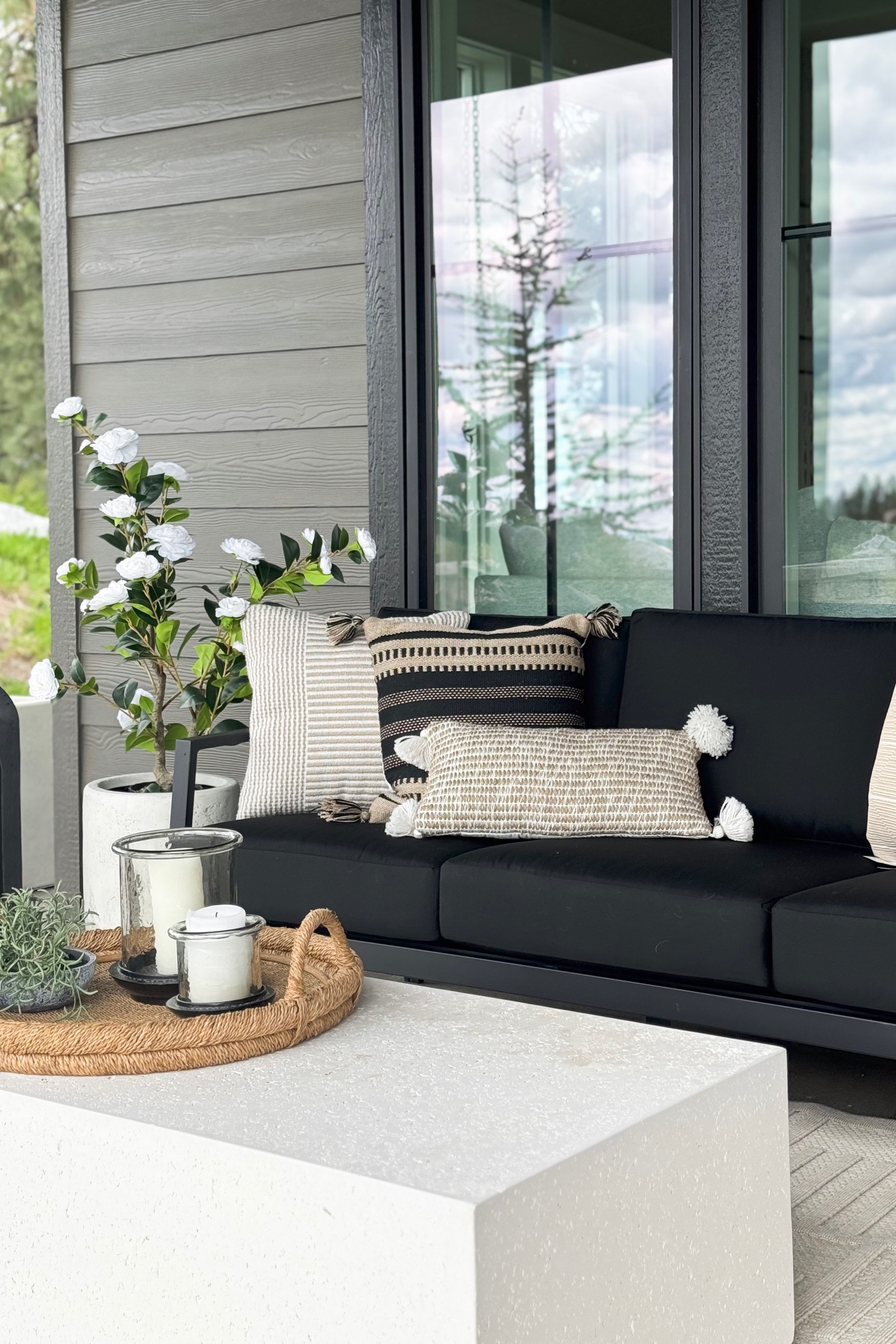 I love the contrasting colors in this outdoor space - adds a bit of dimension, don't you think?

Home  home decor  home finds  outdoor  outdoor decor  outdoor finds  outdoor seating  faux greenery  lanterns  throw pillows

#LTKSeasonal #LTKhome