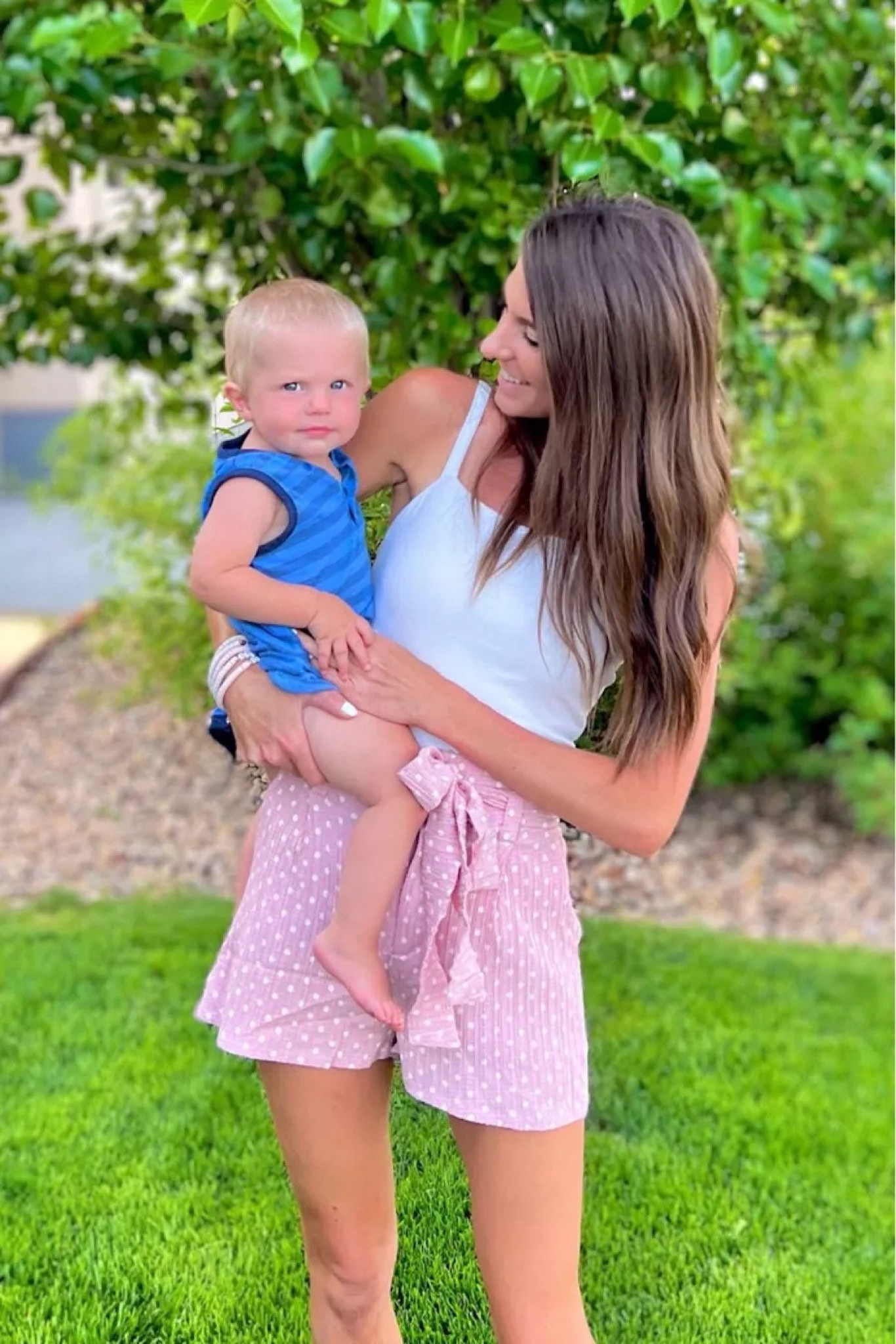 These comfortable white bodysuit and pink polkadot shorts make the perfect outfit for when you're looking after your kids! #casuallook #beachoutfit #summerstyle #resortwear

#LTKstyletip #LTKkids #LTKSeasonal