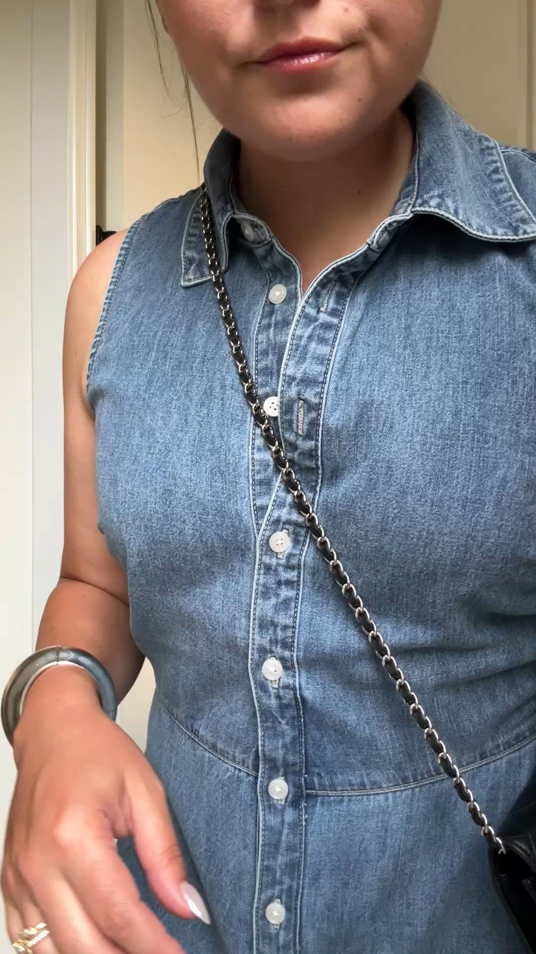 Veronica Beard ankle-length sleeveless denim dress — wearing an 8. TTS, but would size up if you’re in between. I’m a 6/8 at the moment:
Black strappy sandals with a silver metal detail — also true to size. Pretty comfortable! No blisters or break-in time — I’ve worn them to two concerts. Great look for less to Loeffler Randall.
Black lambskin Chanel wallet on a chain with silver hardware.
Silver cuff bangle — love this one so much.