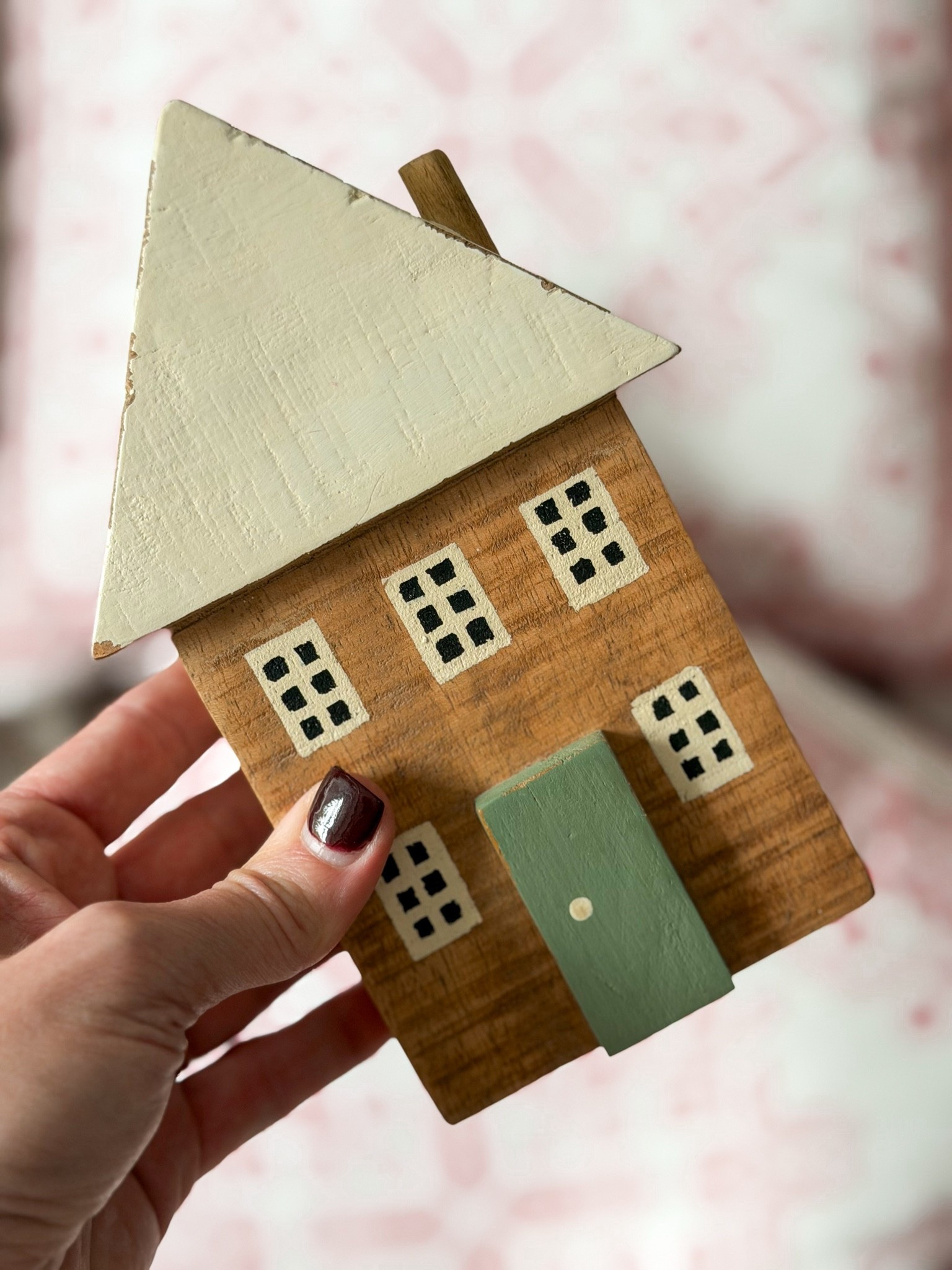 The medium sized wooden house.