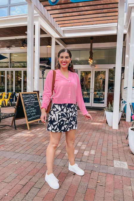Simple yet cute Spring Outfit 🩷🖤 I’ve really been into skorts lately. How about you? They are so cute and comfortable. Wearing this floral skort in a size 2. Wearing XS in the cardigan and comes in other colors. 

#LTKSeasonal #LTKxTarget #LTKfindsunder50
