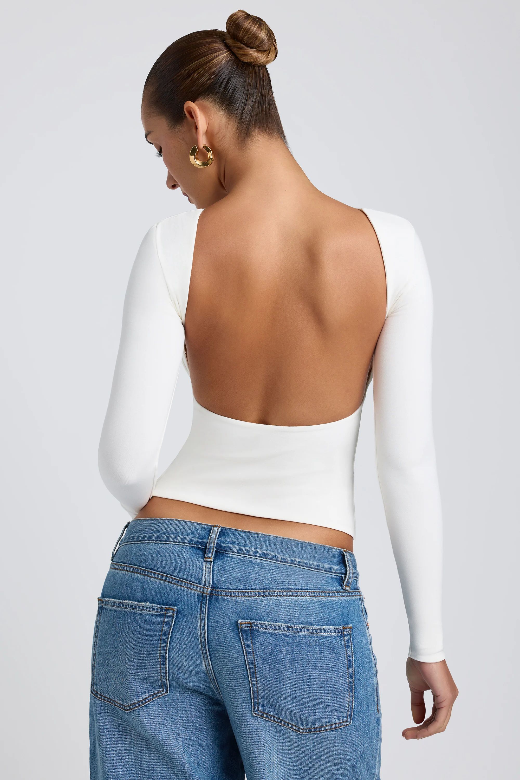 Modal High Neck Long Sleeve Open Back Top in White | Oh Polly