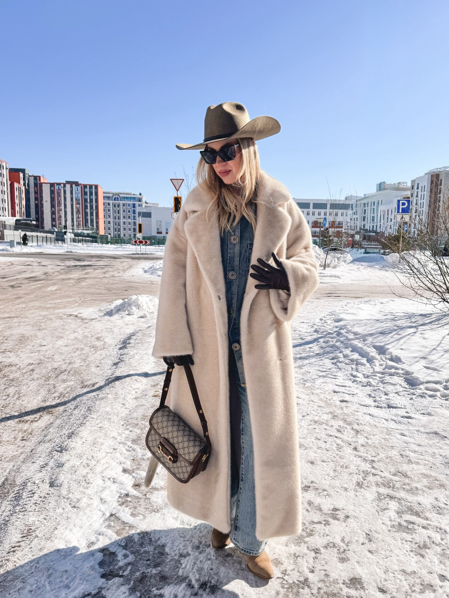 Beige faux fur coat, all denim, denim on denim, @Levi's bootcut jeans, @Janessa Leone western hat, Gucci bag, western style outfit

#LTKSaleAlert #LTKSeasonal #LTKOver40