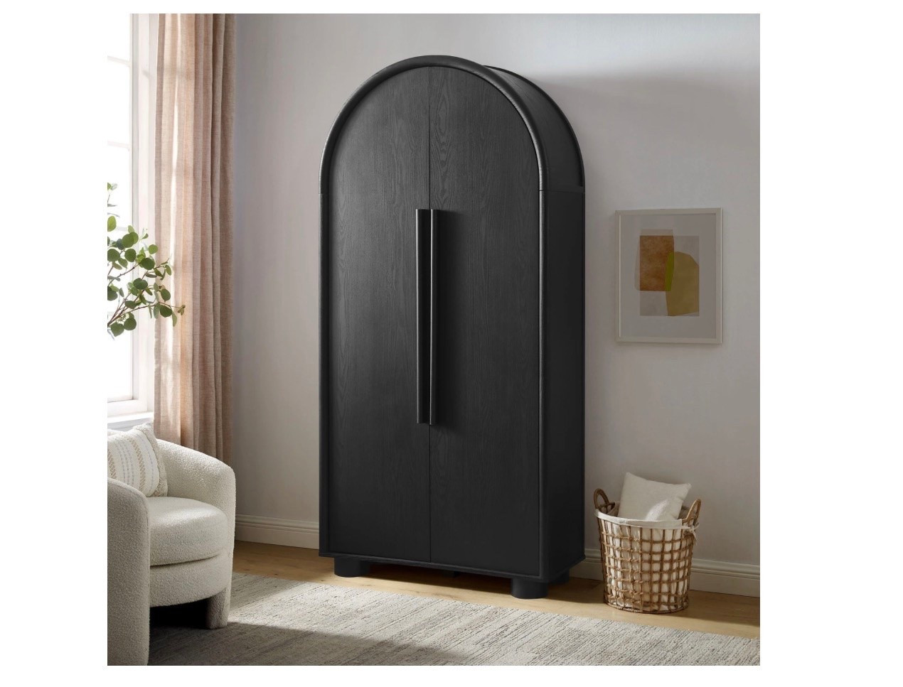 Blending contemporary design with functional elegance, the Bellamy Storage Cabinet creates a refined storage solution for kitchens, dining rooms, and living spaces. Featuring a graceful arched silhouette, this tall pantry cabinet makes a stylish statement while offering ample space for organizing pantry essentials, linens, or household items. Crafted with a beautiful wood grain finish, this storage cabinet is designed with distinctive elongated handle pulls and unique rounded feet, adding a touch of modern sophistication. The soft-close doors open to reveal two adjustable shelves along with a fixed shelf, allowing for customizable storage options. Thoughtfully designed with non-marking floor glides for stability and floor protection, this versatile cabinet is perfect for any space

#LTKHome #LTKSaleAlert #LTKvlog