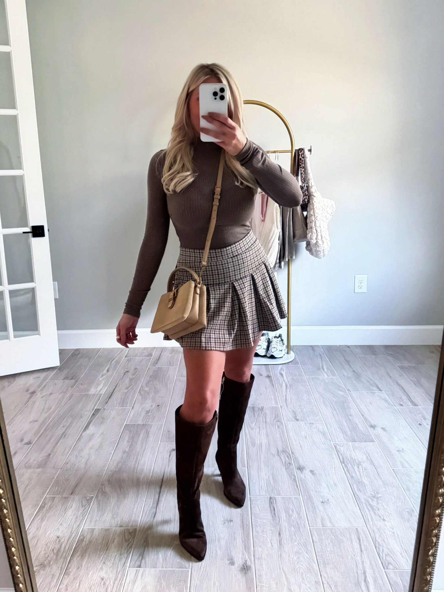 Thanksgiving outfit! I loveeee this skort so much! It’s super stretchy! I did a medium but could have done a small! So cute and comfortable from American eagle 🫶🏼🤎

#LTKSeasonal