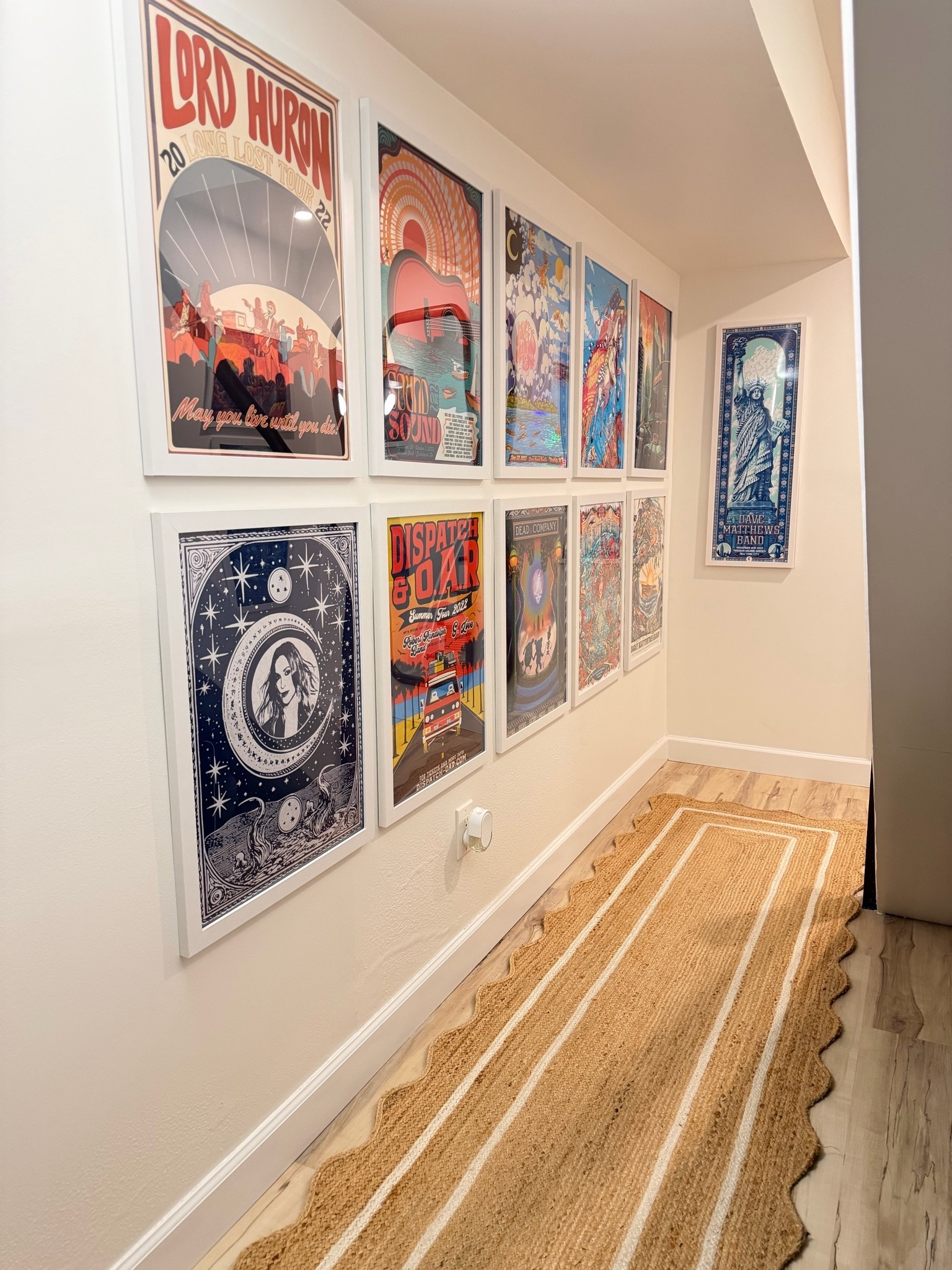 Amazon scalloped runner rug and white poster frames