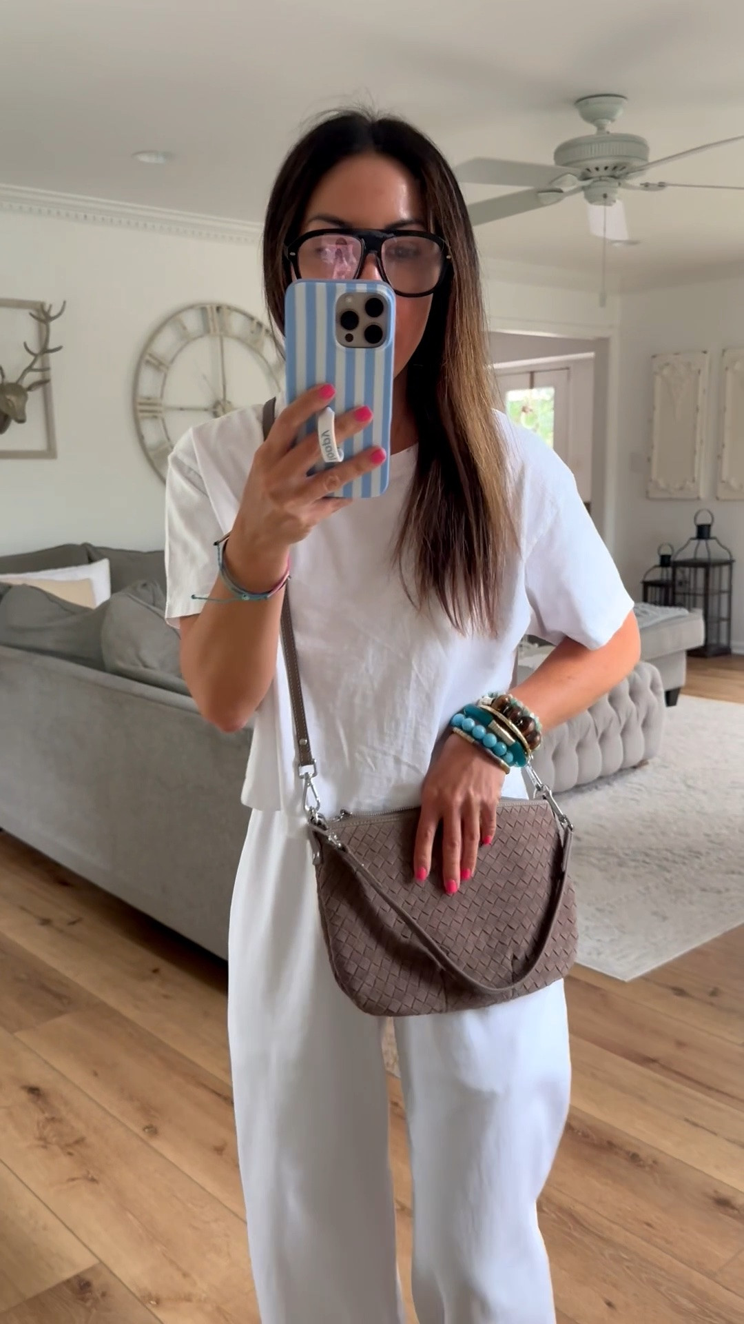 Jewelry code HOUSEOFLEO20. Crossbody bag, beaded bracelets. Outfit code SIGNATURE. Xs white pants. Small white T-shirt.

#LTKOver40 #LTKSaleAlert #LTKPetite