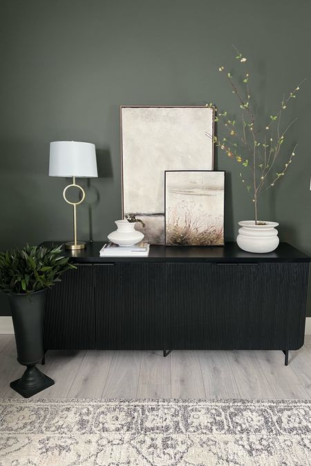My moody sideboard: styled with some lighter pieces. I love the light and airy stem. Styling it in a planter like this..looks like a little tree. So cute right ✨
Home office inspiration, console styling, modern organic home 
