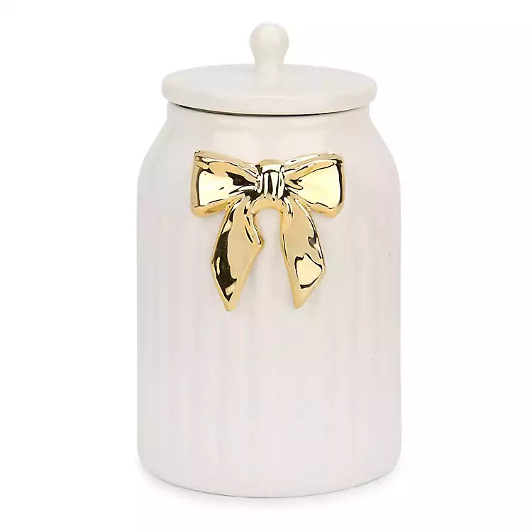 New! Gold Bow Ceramic Canister | Kirklands