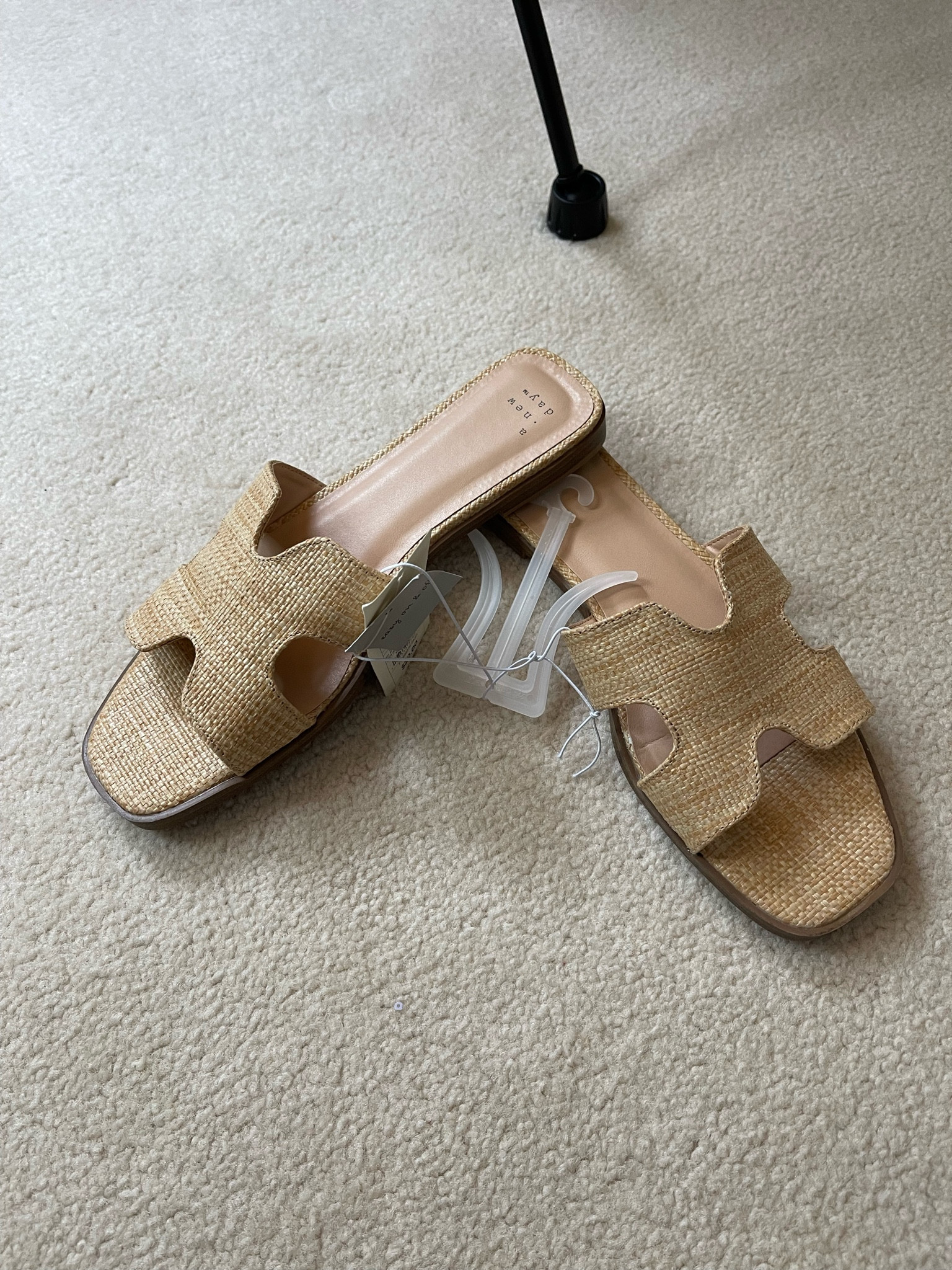 Designer inspired raffia flat slides from Target. Perfect for all of your spring and summer outfits.

#LTKshoecrush #LTKSeasonal #LTKover40