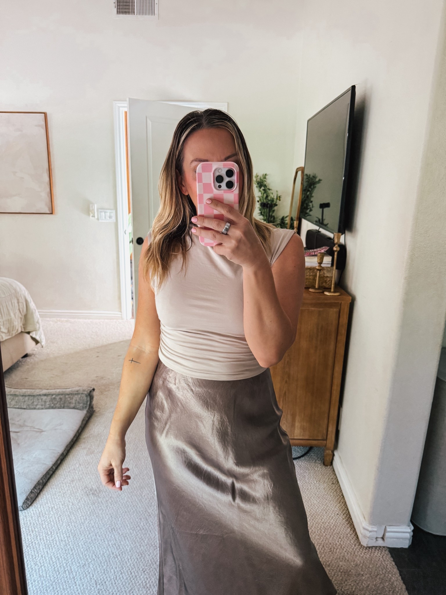 Elevated basics that can take you from season to season and pretty much every occasion 

Sleeveless top: wearing small, runs tts but is very firm fitting. Keep in mind if that’s not your thing

Skirt: size 6 color nomad taupe. I’m just shy of 5’2” and the length works great for me

#LTKfindsunder100 #LTKstyletip