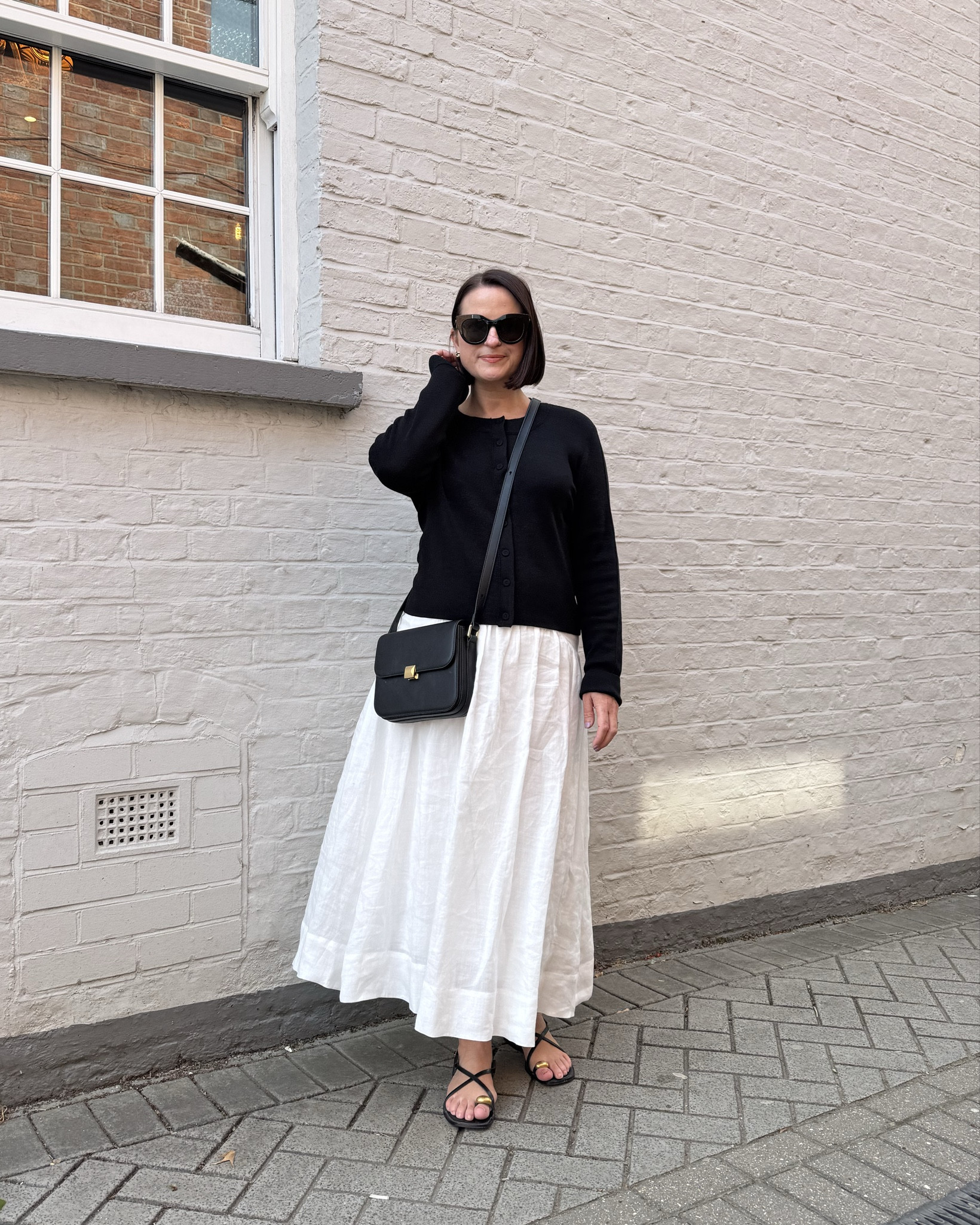 Monochrome look
Black wool cardigann
White maxi skirt
Scrappy black sandals
Black lock crossbody bag
Gold clip bangle


#LTKeurope #LTKsummer #LTKuk