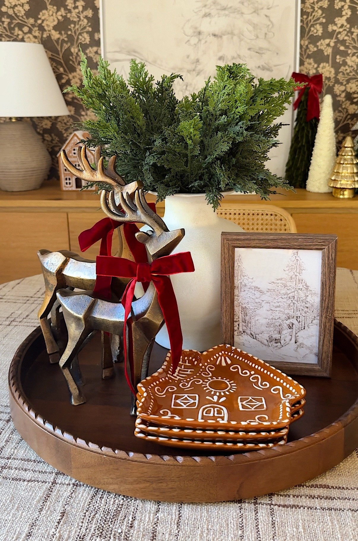 Christmas centerpiece idea🎄

I am loving the cedar branches and cute little red velvet bows! The reindeer I got home HomeGoods so I linked similar ones below 👇 

#LTKHoliday #LTKHome #LTKSeasonal