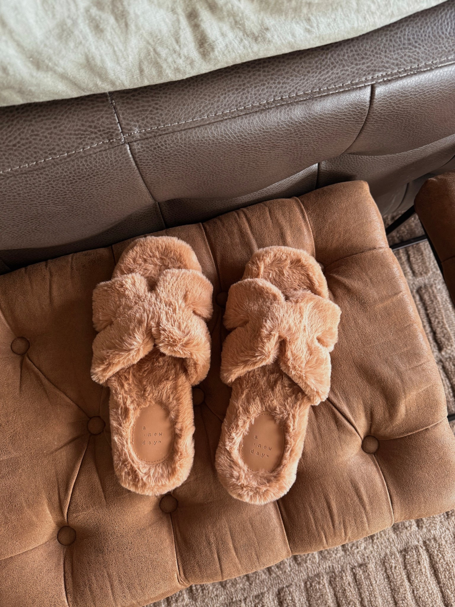 Teddy bear vibes fuzzy slippers from target. Only $15! 

#LTKSeasonal #LTKHome #LTKFindsUnder50
