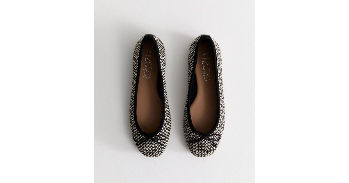 Wide Fit Black Raffia Look Bow Detail Ballerina Pumps
						
						Add to Saved Items
						Remov... | New Look (UK)