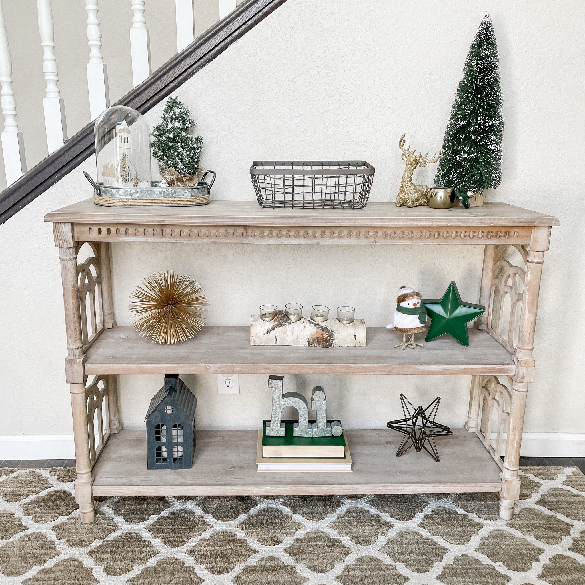 Wintery green styled entryway table 

#LTKhome #LTKHoliday #LTKSeasonal