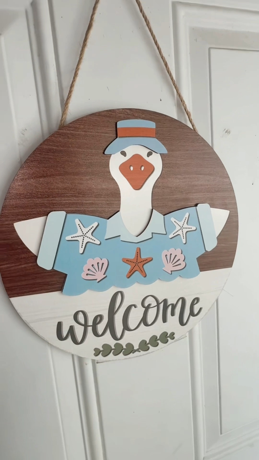 Porch goose welcome sign