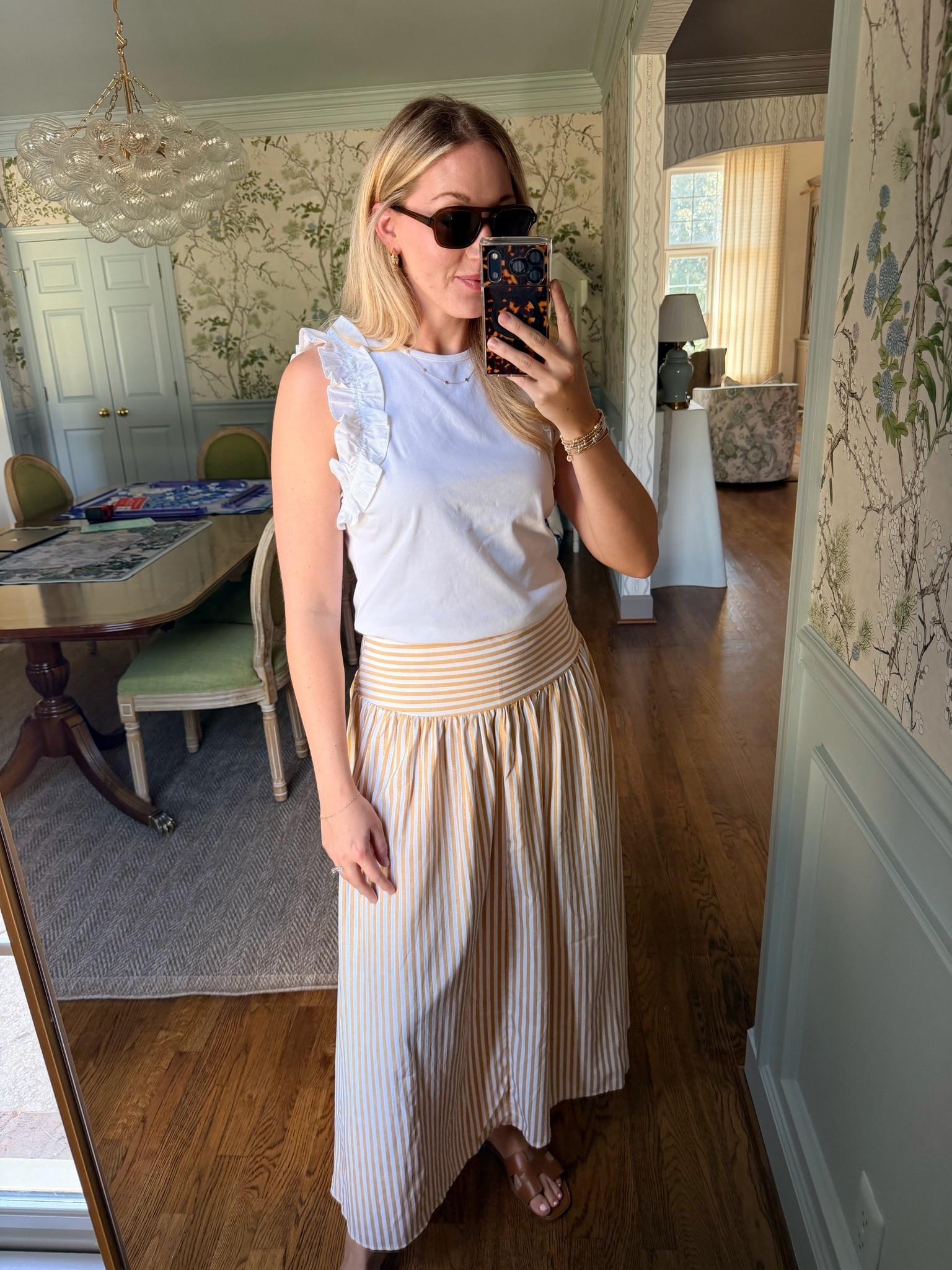 Wearing M in top and skirt
