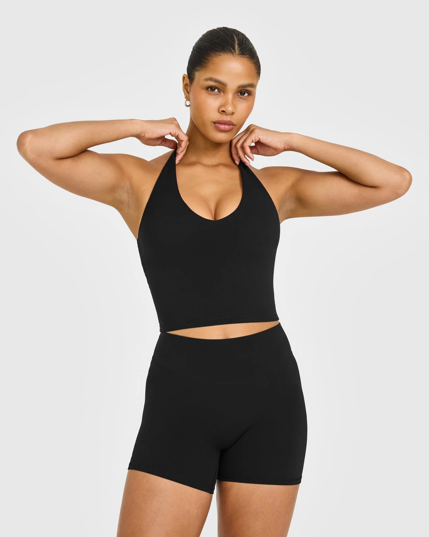 SoftMotion™ Halter Neck Mid Tank Top with Built in Bra Shelf with White Logo 
 Black | Oner Active (UK / US)