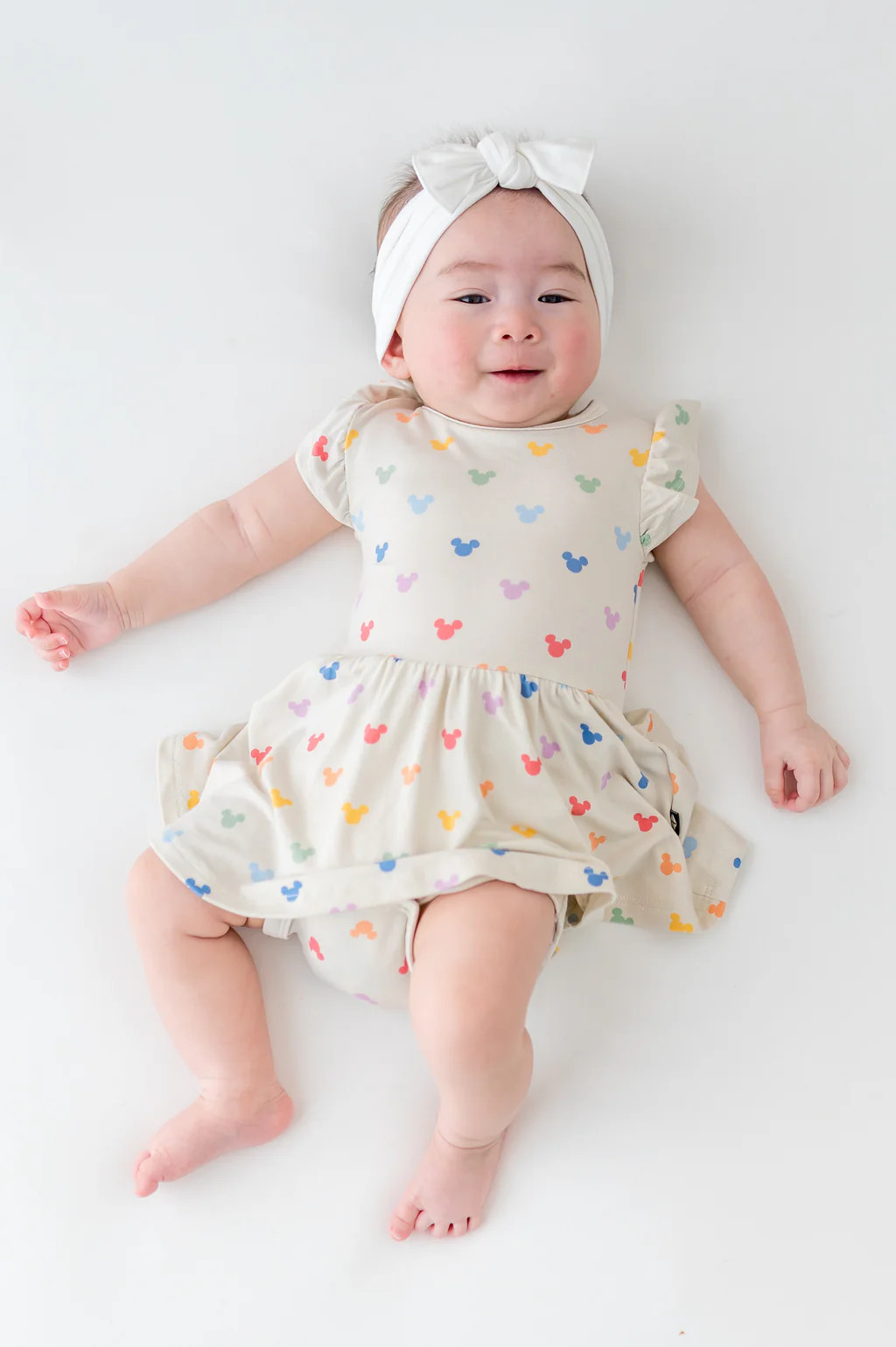 Twirl Bodysuit Dress in Pastel Mickey Mouse | Kyte Baby