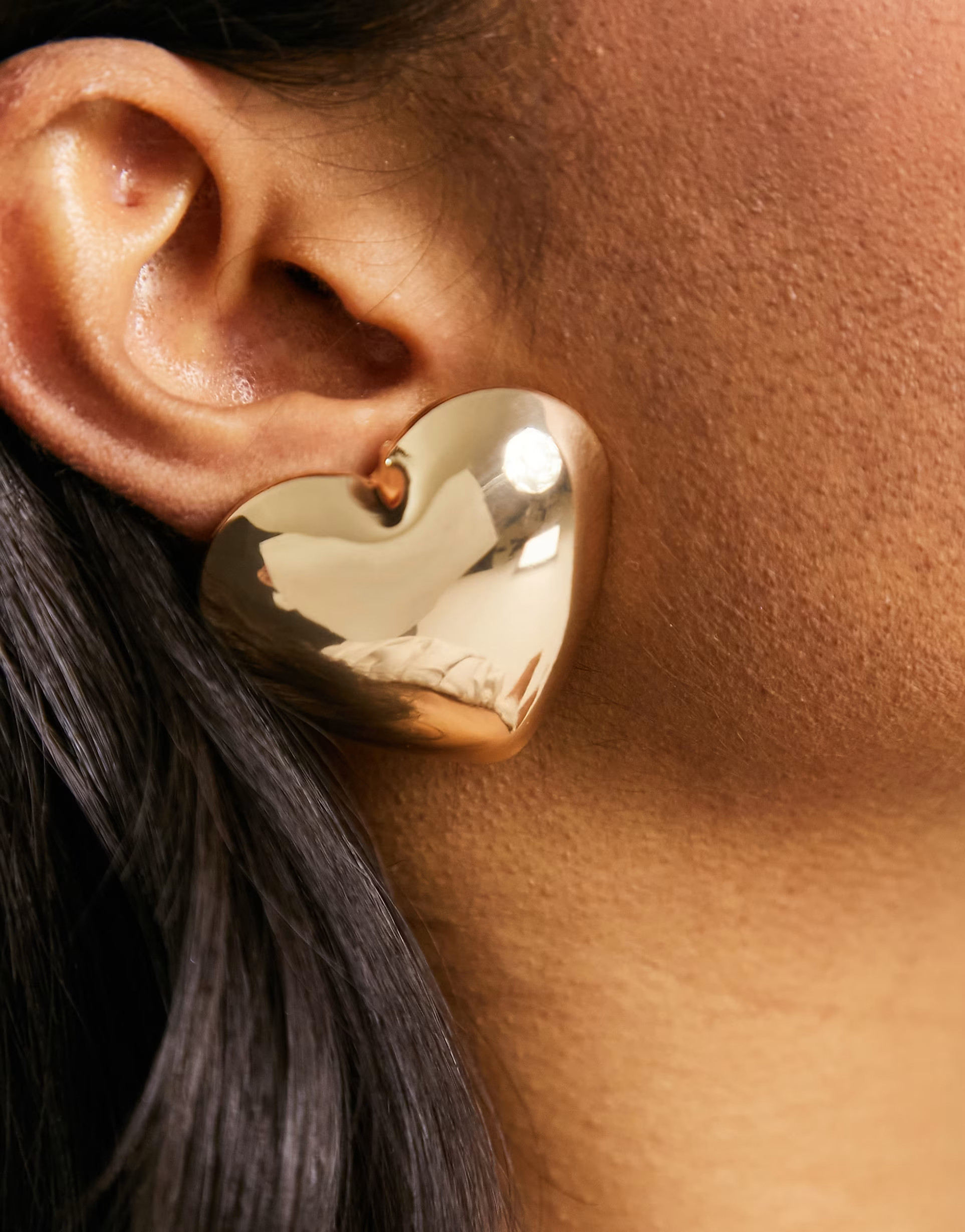 ASOS DESIGN stud earrings with oversized puff heart in gold tone | ASOS (Global)