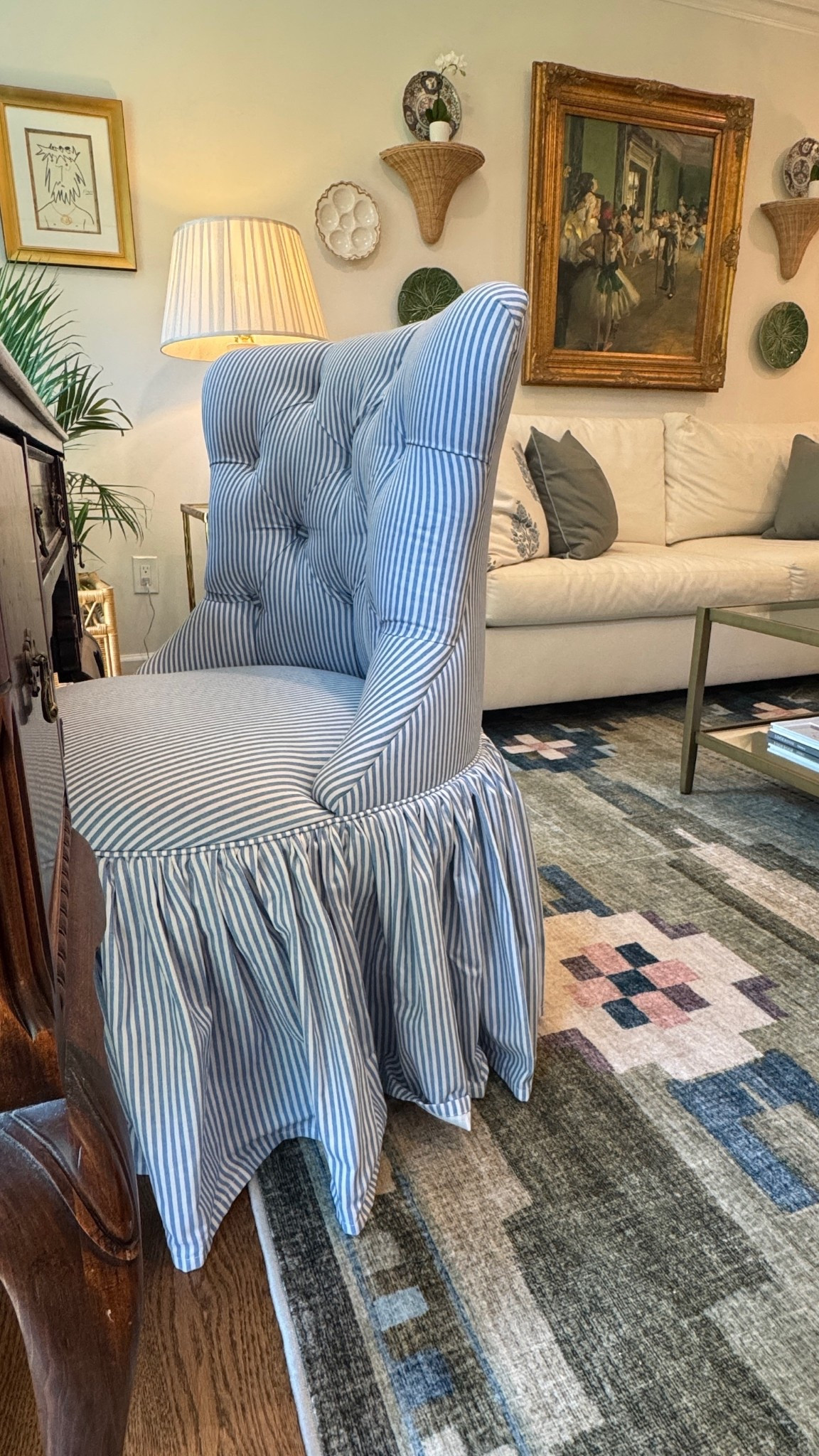 Love this desk chair. Perfect for a classic touch, plus it’s super comfortable. Striped desk chair, statement chair, classic style, Grandmillennial home, work from home decor, framed tv, block print curtains

#LTKHome