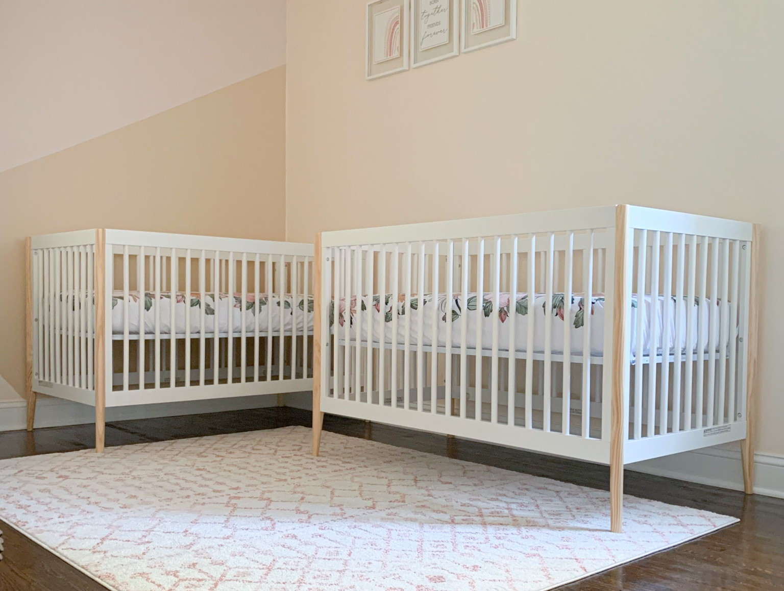 Beautiful convertible cribs that don’t overpower our twins’ nursery. Sleek design and that pop of natural wood is so in!

#LTKhome #LTKbaby #LTKkids