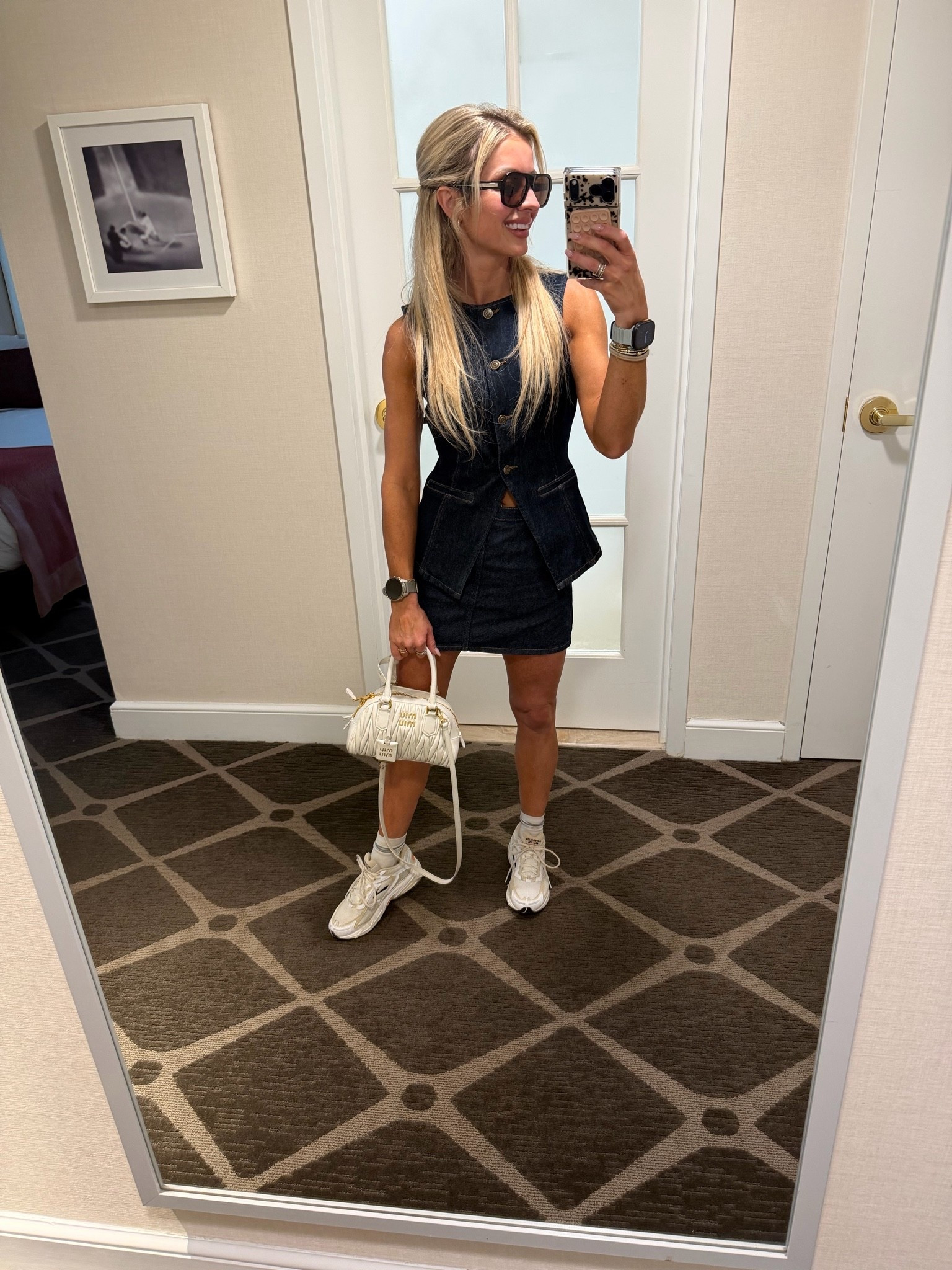 All denim vest and skirt outfit with my favorite lifestyle sneaker from Brooks running and of course my favorite Miu Miu purse

#LTKgrwm #LTKootd #LTKTravel
