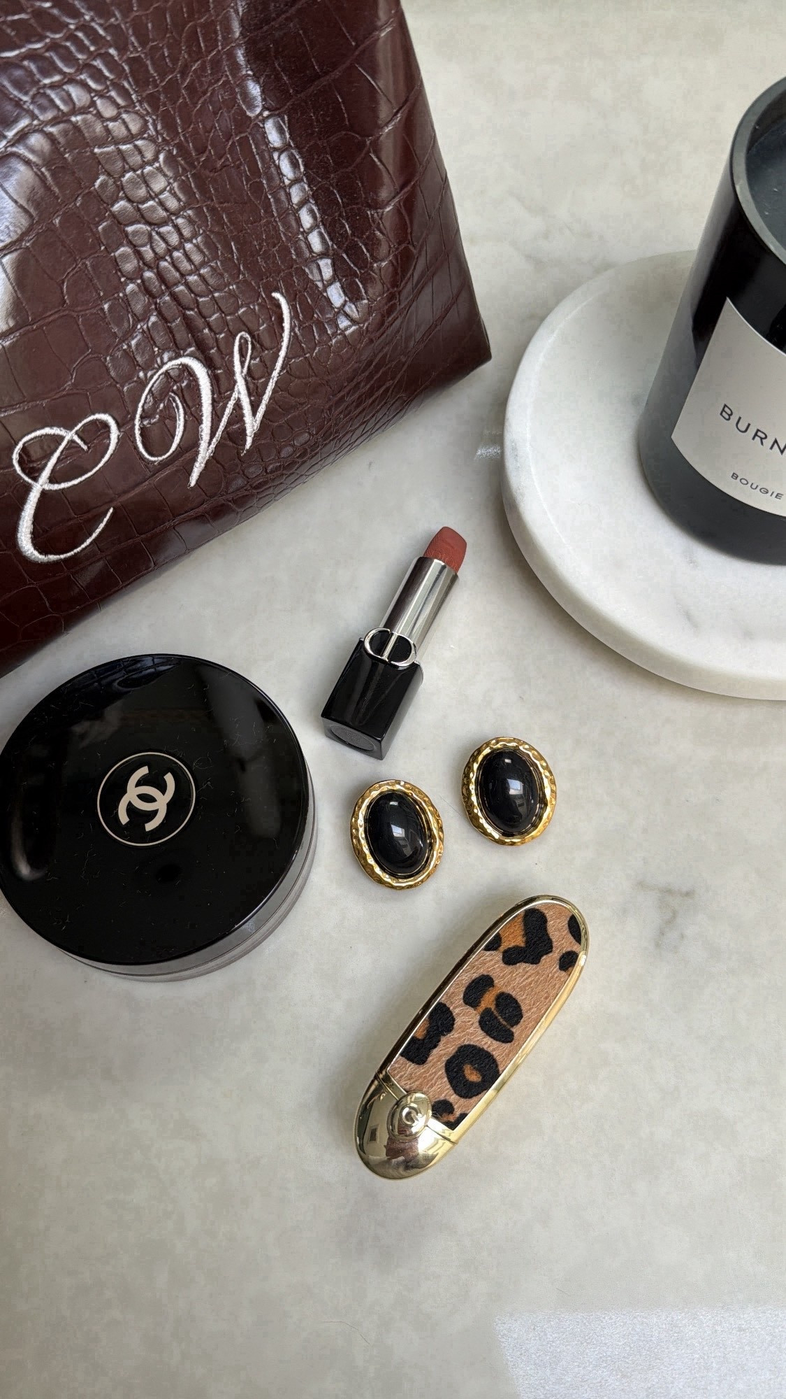 Black and gold earrings, leopard lipstick, luxury candle, bathroom, accessories, beauty, makeup.

#LTKBeauty #LTKselfcare