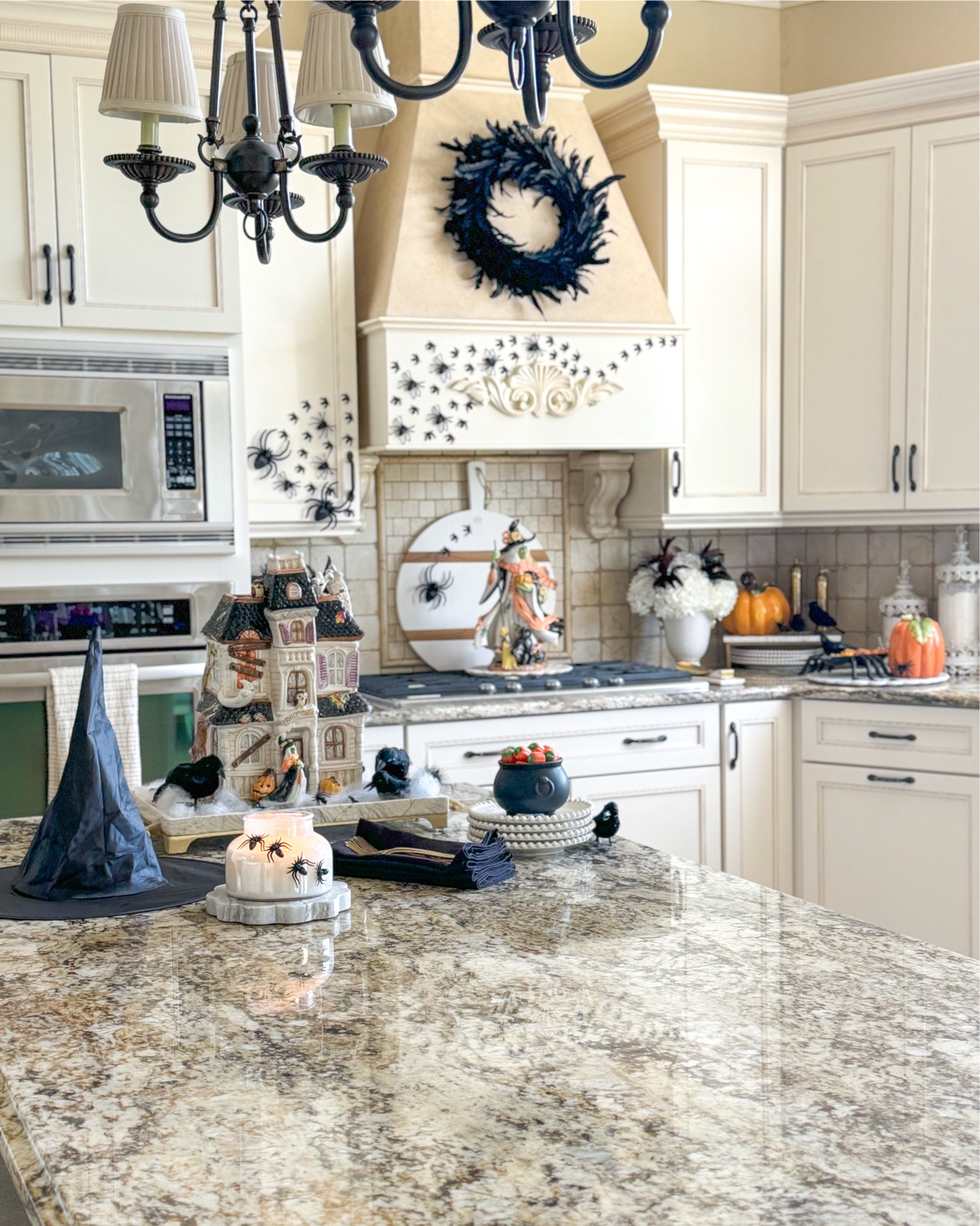 Shop my Halloween kitchen!

Orange pumpkins, Halloween decor, haunted house cookie jar, witch figurine, feather wreath, marble tray, spider decor, black linens, Halloween party, Halloween entertaining, Falloween decor, charcuterie board, white vase, gold vase, salt pepper mill, petal tray, Fitz and Floyd

#LTKSeasonal #LTKHome #LTKParties