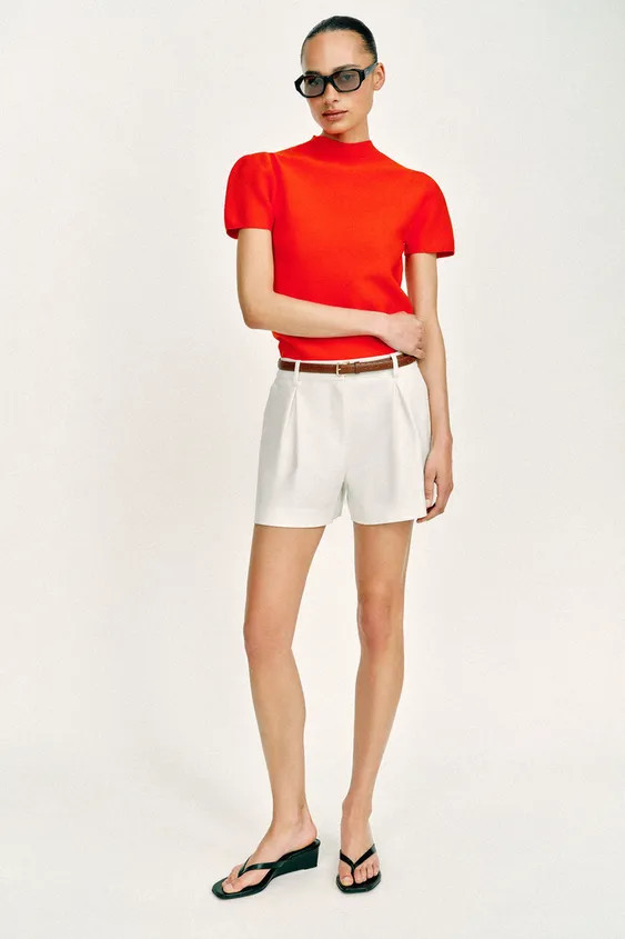Mid-rise shorts with front pleats and belt. Front pockets and false back welt pockets. Front zip,... | Zara US